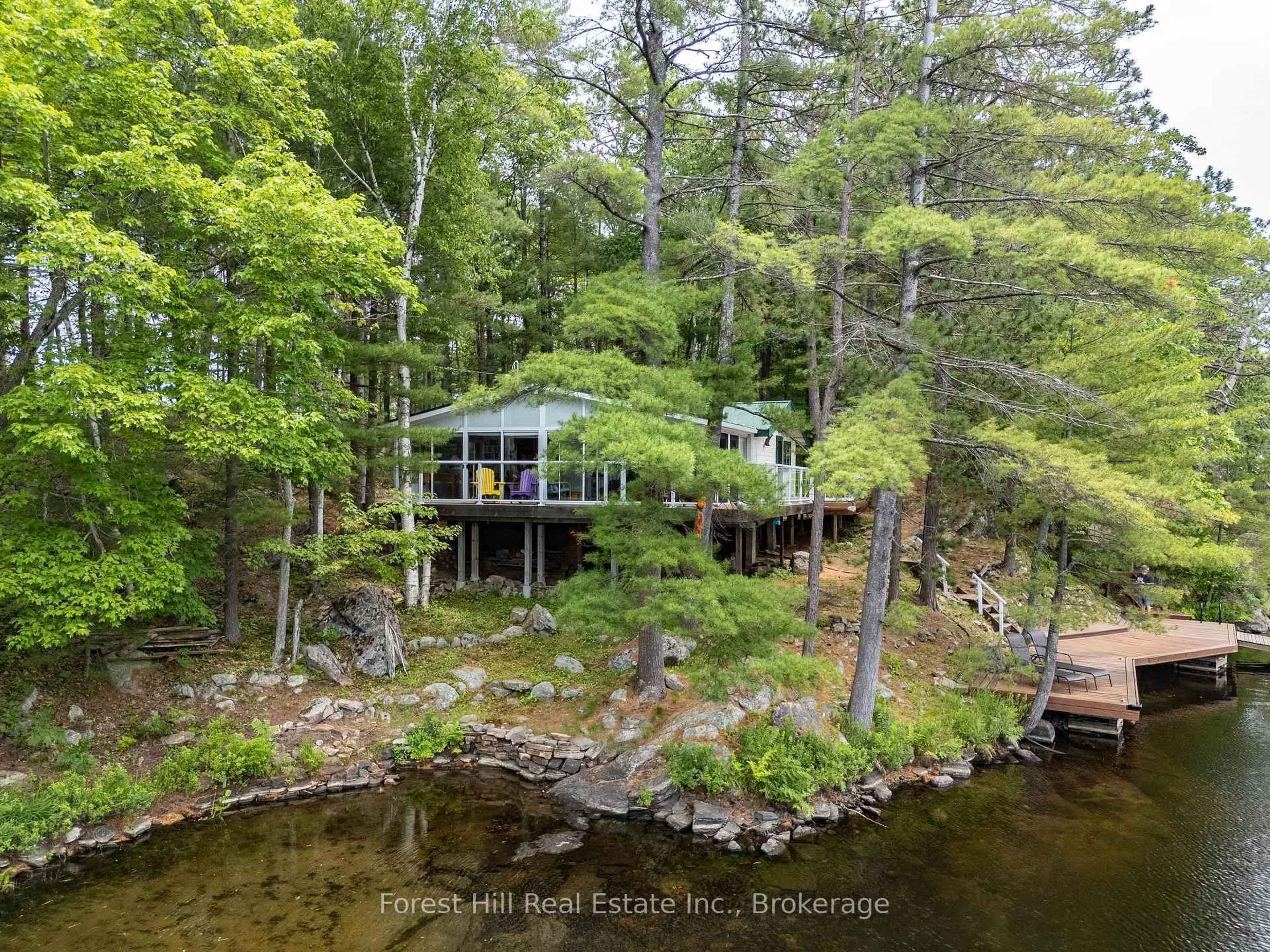 A pic from outside/outdoor area/front of a property/back of a property/a pic from drone, water/lake/river/ocean view for 1200 Pine Lake, Gravenhurst Ontario P1P 1R2