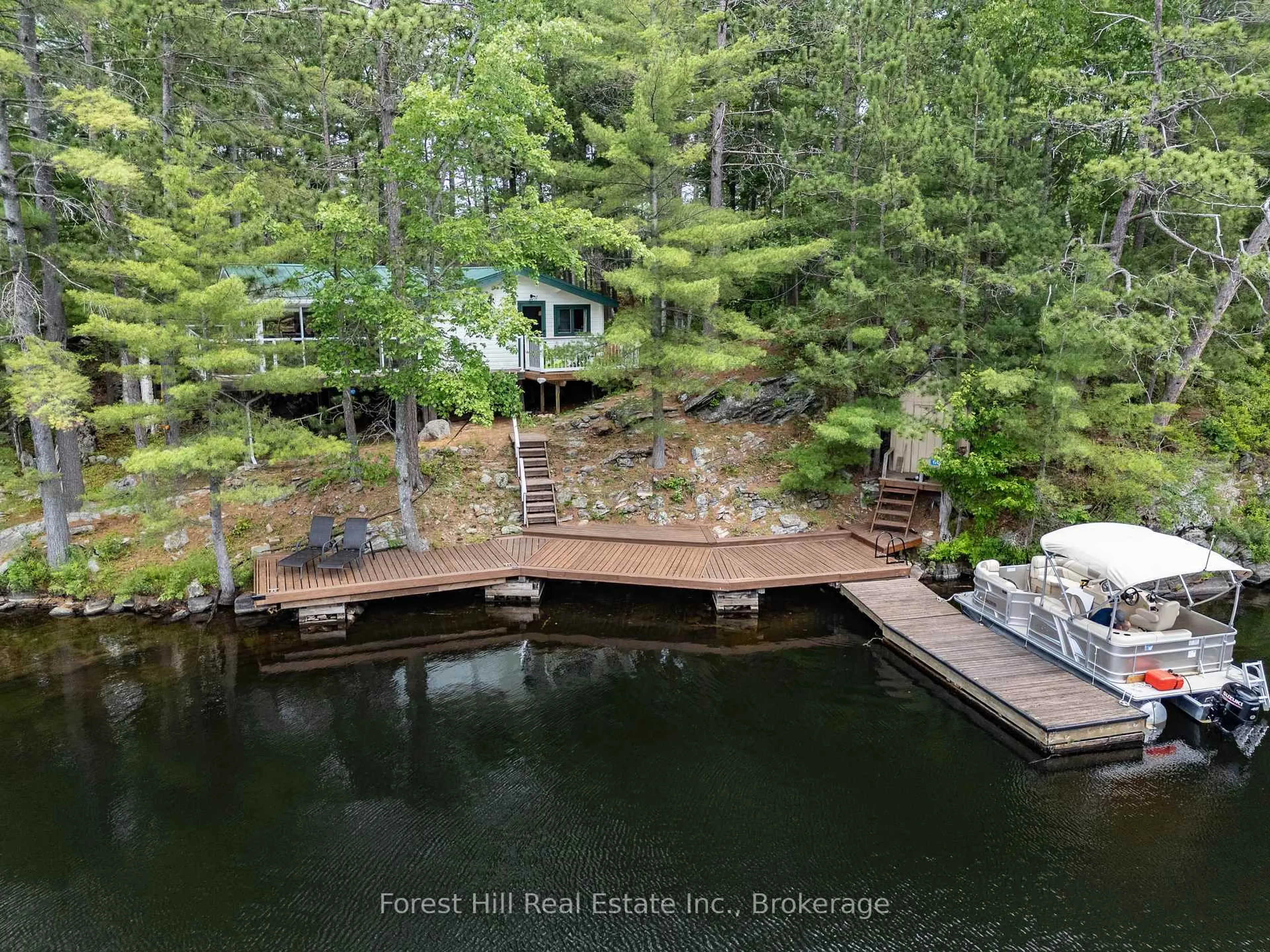 A pic from outside/outdoor area/front of a property/back of a property/a pic from drone, water/lake/river/ocean view for 1200 Pine Lake, Gravenhurst Ontario P1P 1R2