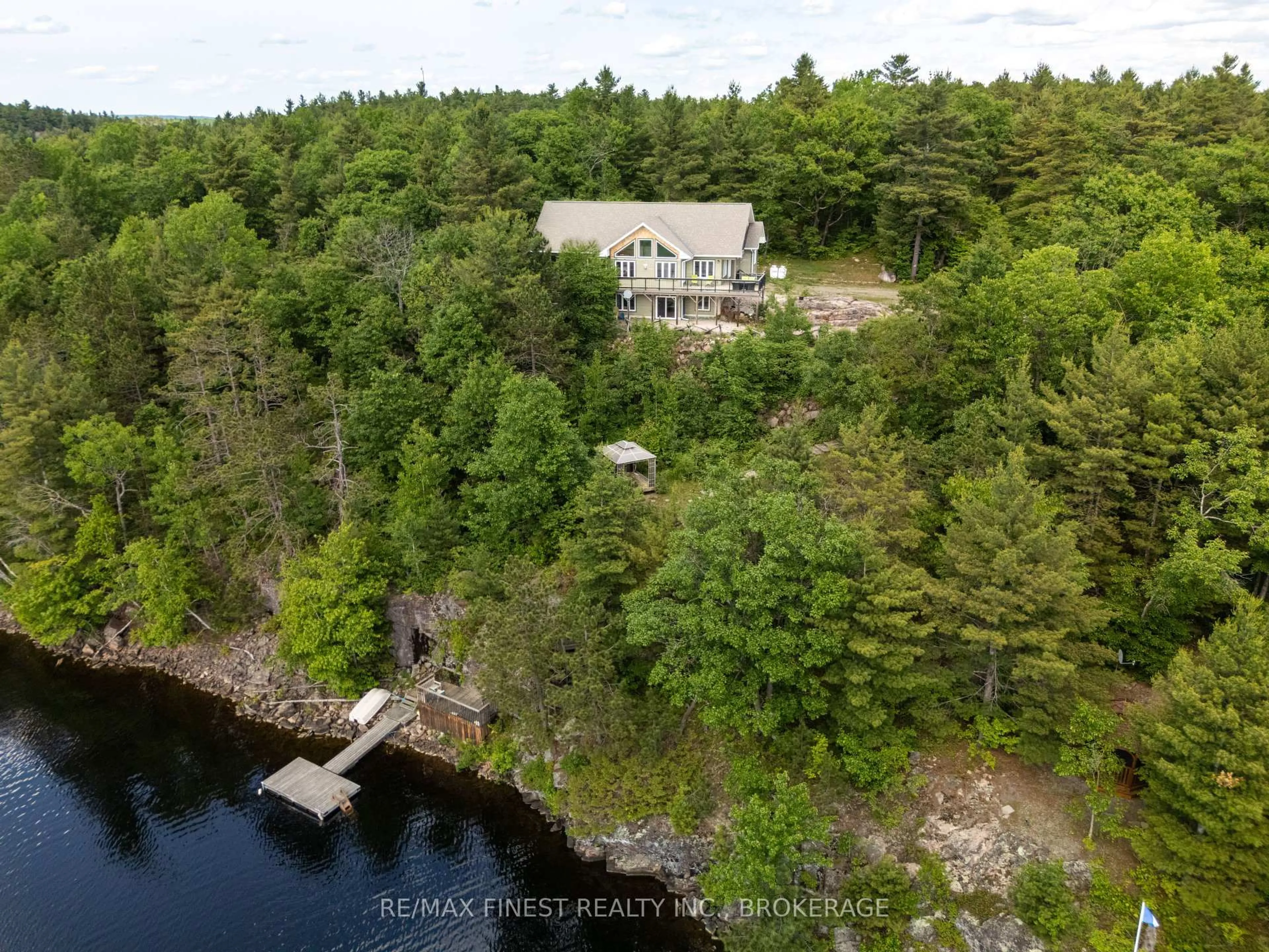 A pic from outside/outdoor area/front of a property/back of a property/a pic from drone, water/lake/river/ocean view for 2092 Beach Rd, Plevna Ontario K0H 2M0