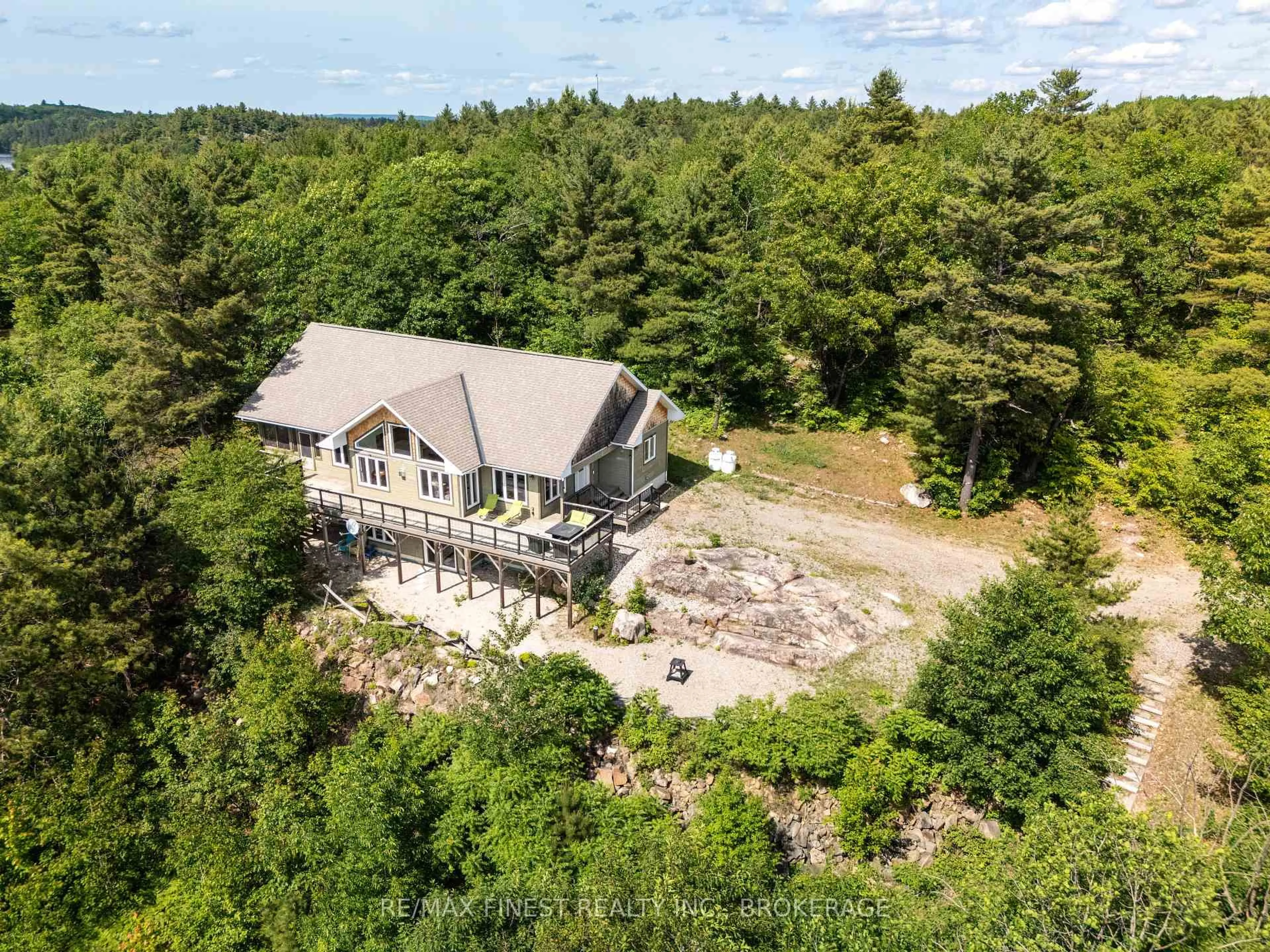 A pic from outside/outdoor area/front of a property/back of a property/a pic from drone, water/lake/river/ocean view for 2092 Beach Rd, Plevna Ontario K0H 2M0