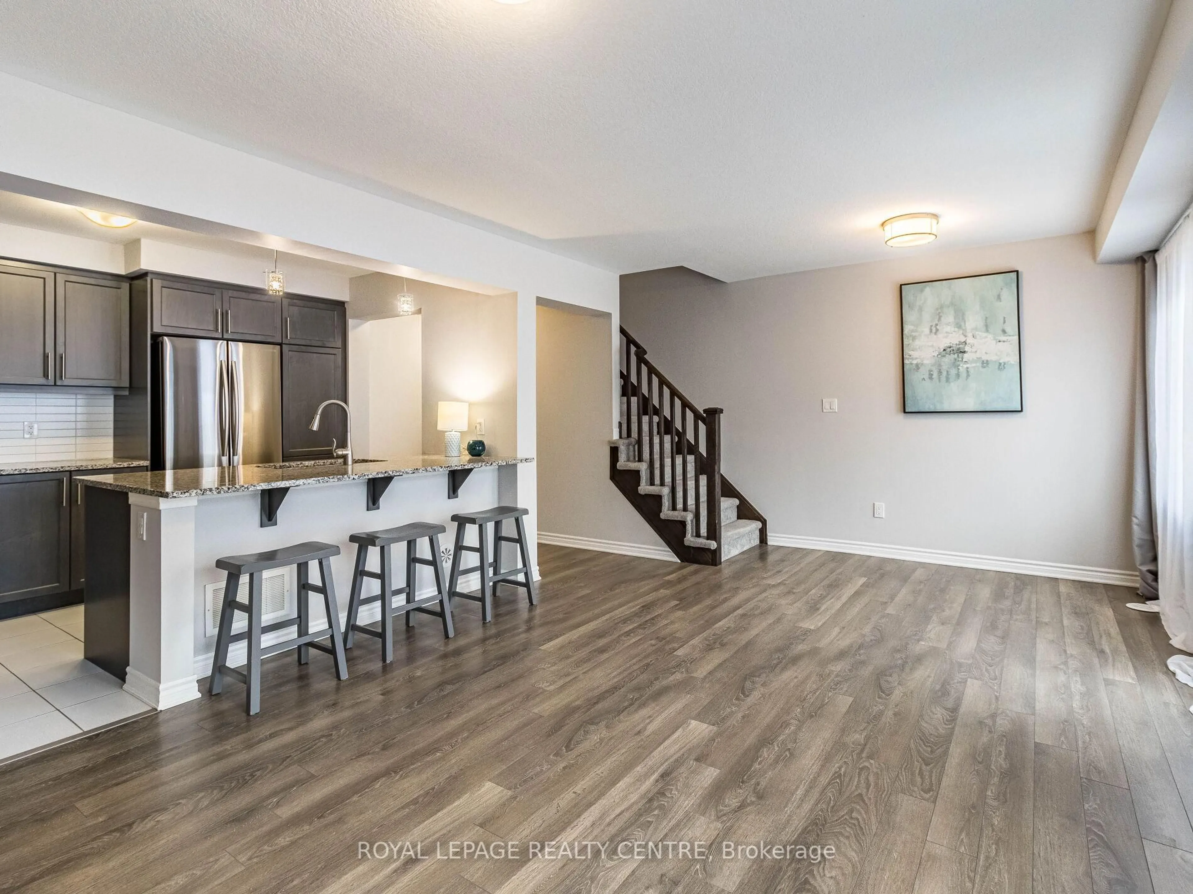 Open concept kitchen, wood/laminate floor for 143 Ridge Rd #57, Cambridge Ontario N3H 4R6