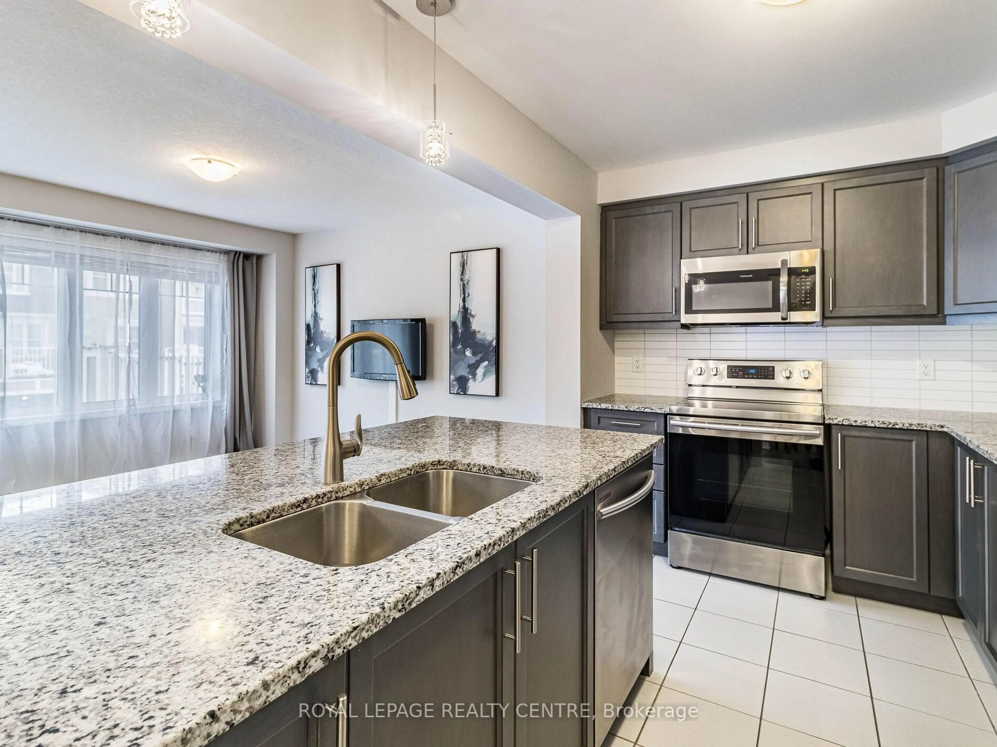 Open concept kitchen, ceramic/tile floor for 143 Ridge Rd #57, Cambridge Ontario N3H 4R6