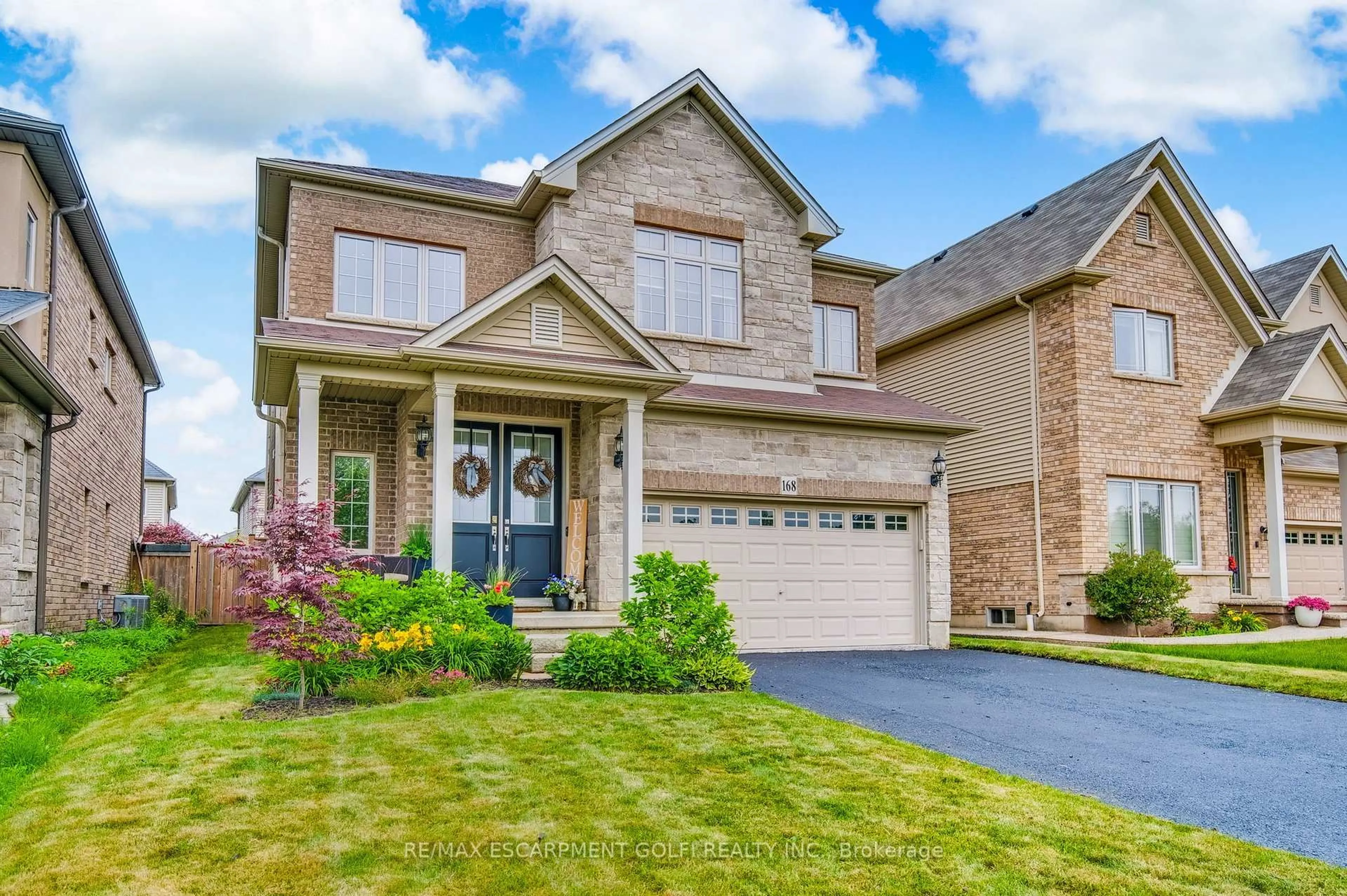 Home with brick exterior material, street for 168 BOOKJANS Dr, Hamilton Ontario L9G 0B7