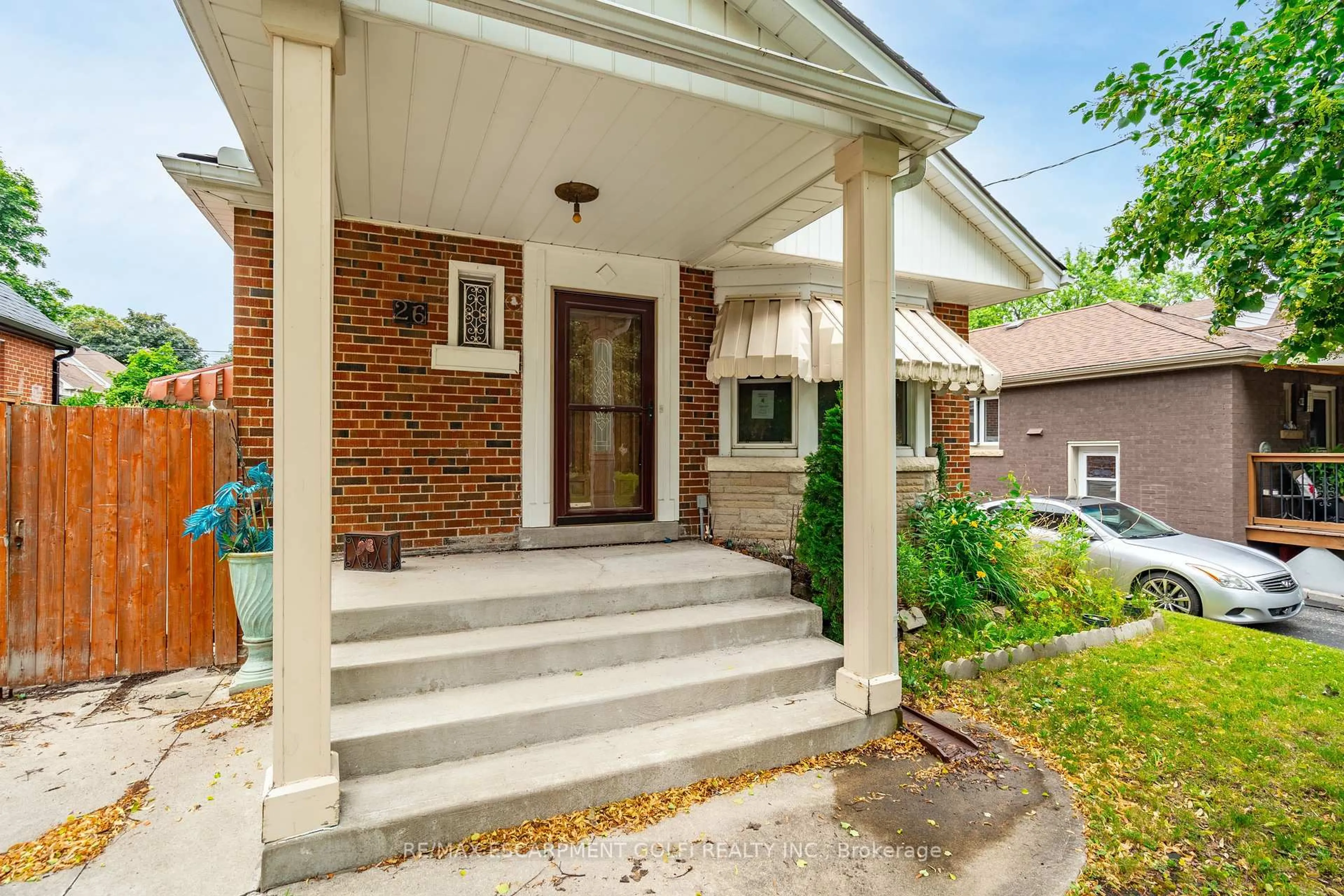 Home with brick exterior material, street for 26 MARTIN Rd, Hamilton Ontario L8K 3N1