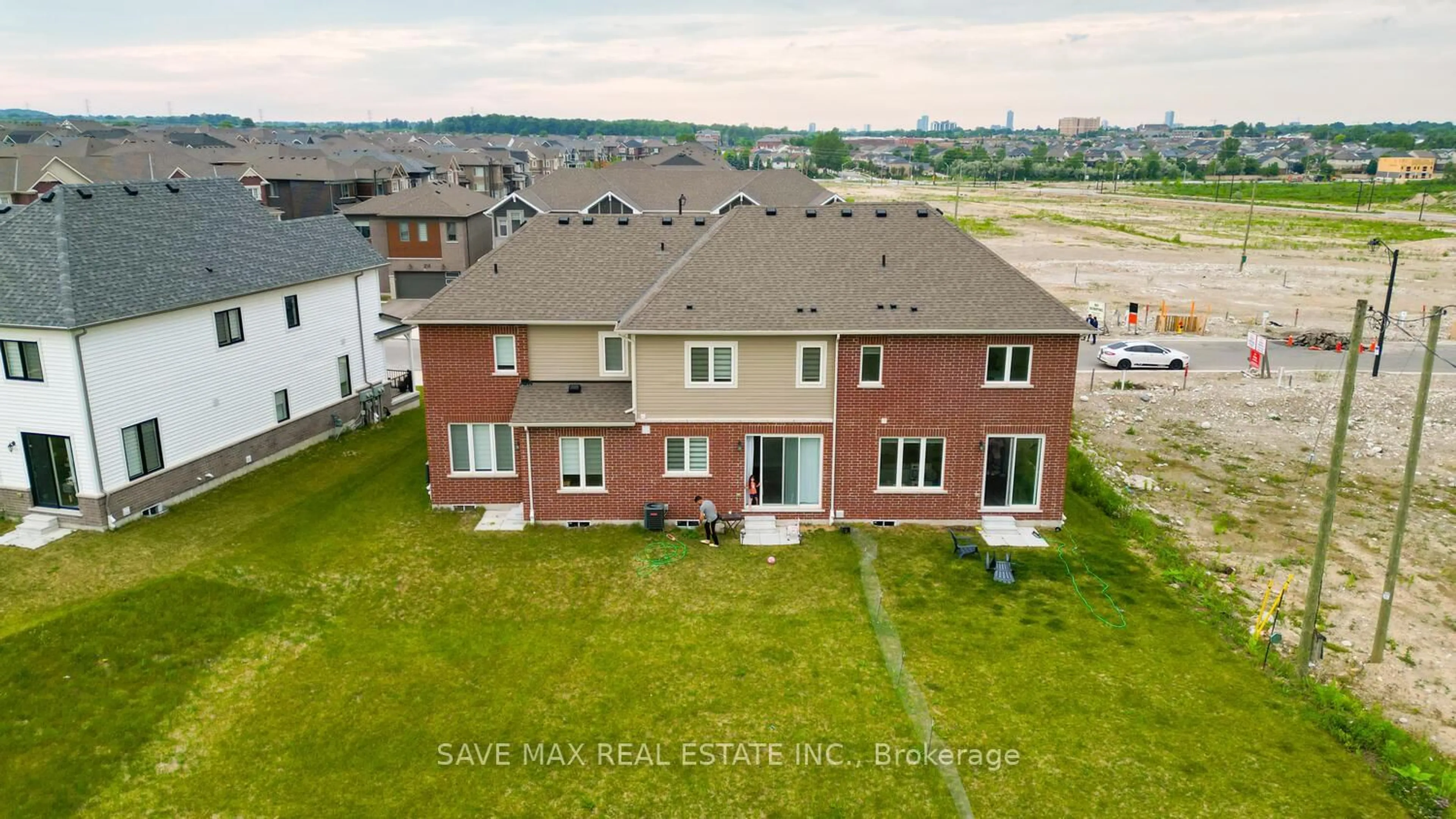 A pic from outside/outdoor area/front of a property/back of a property/a pic from drone, water/lake/river/ocean view for 228 Histand Tr, Kitchener Ontario N2R 0S3