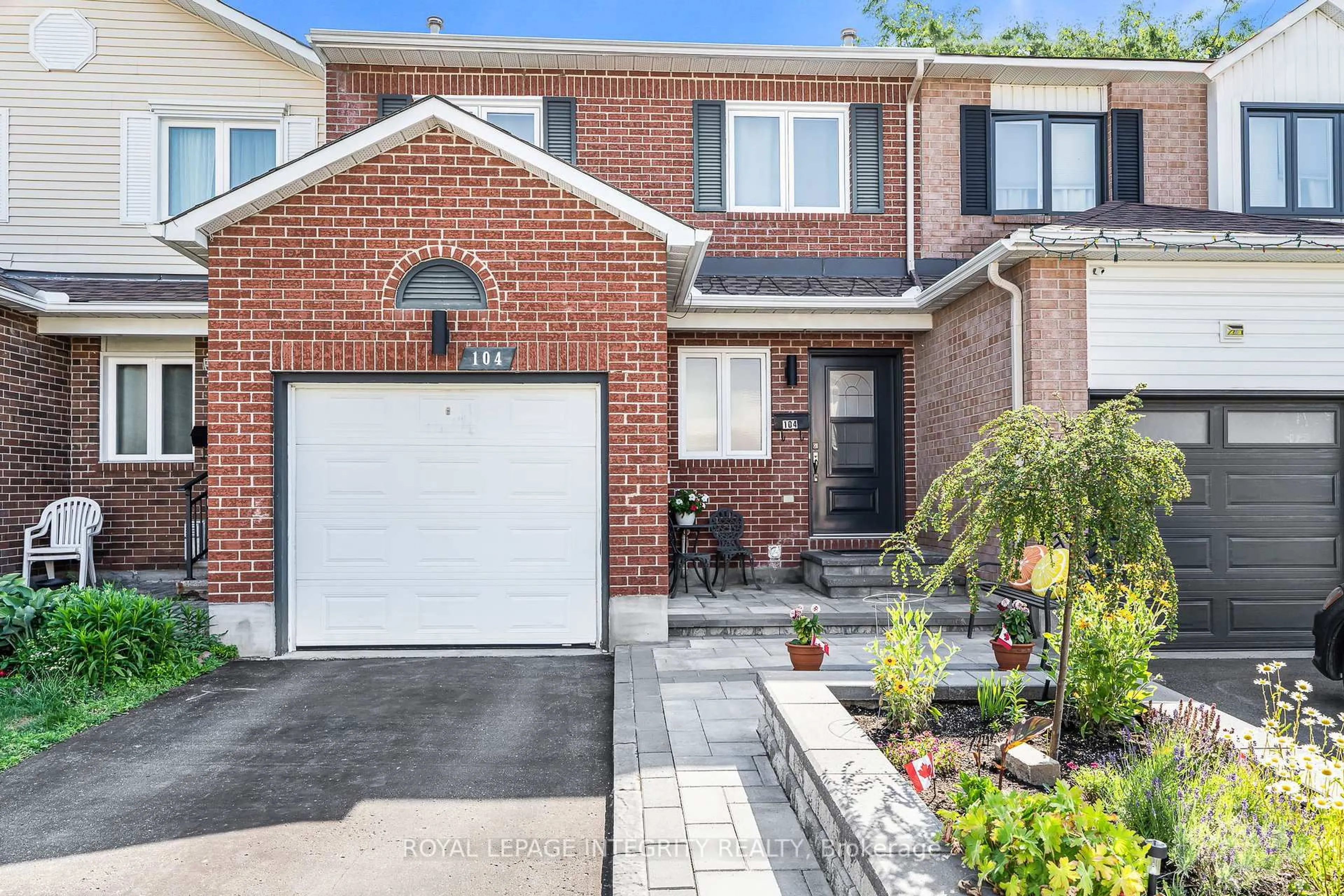 Home with brick exterior material, street for 104 Claiborne Way #37, Orleans Ontario K1E 3V9
