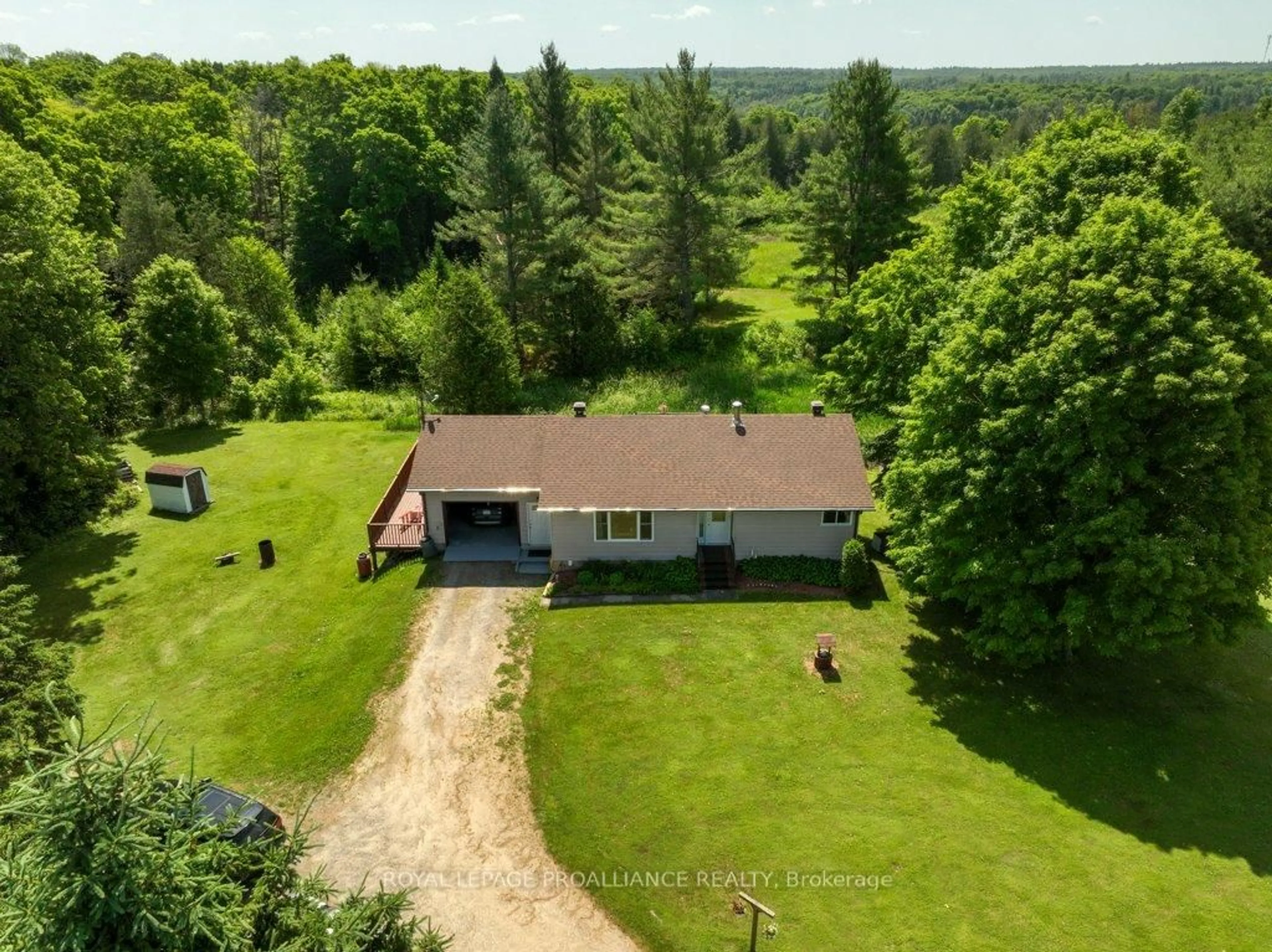 A pic from outside/outdoor area/front of a property/back of a property/a pic from drone, unknown for 6008 Road 506, Cloyne Ontario K0H 1K0