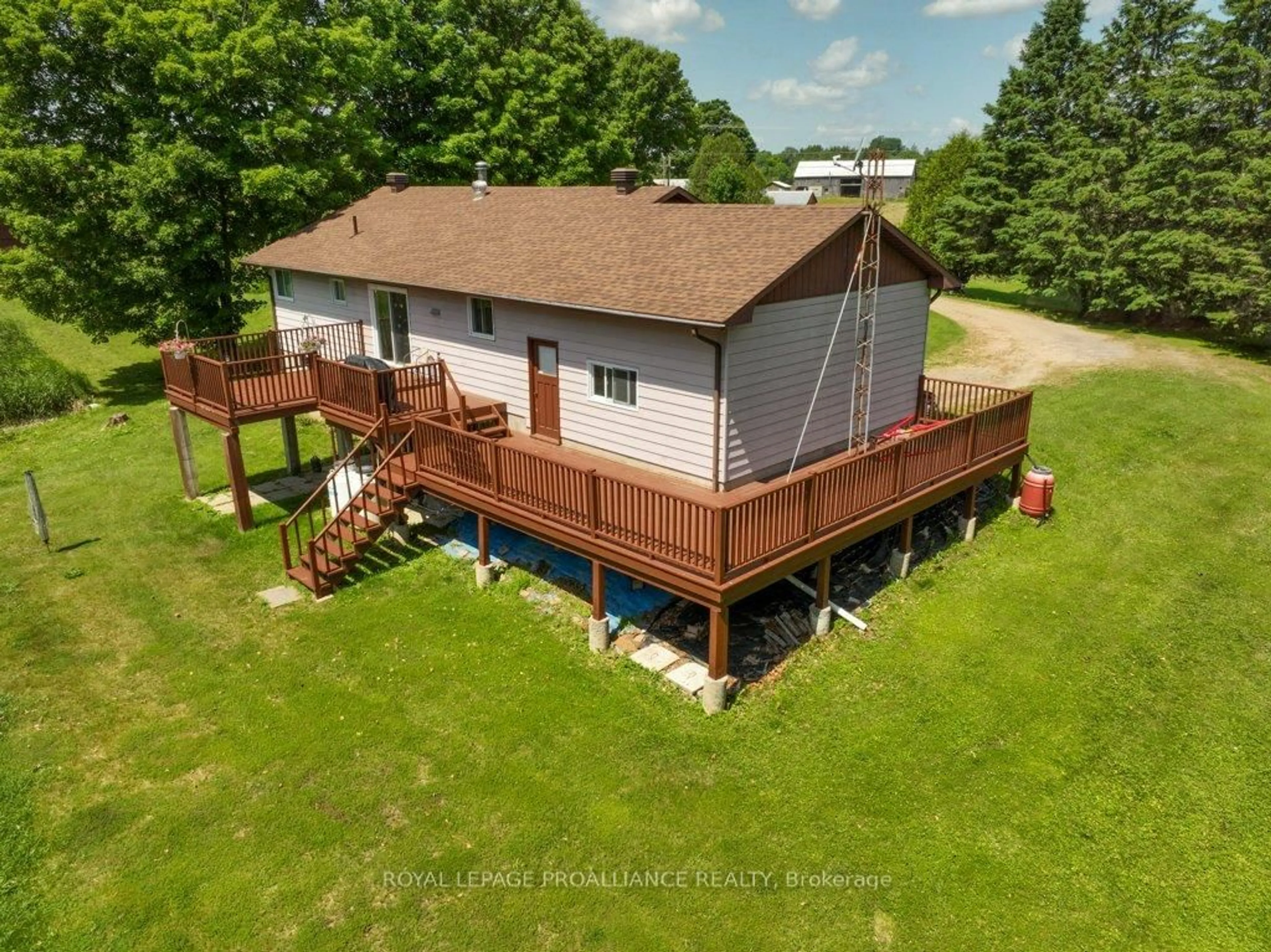 A pic from outside/outdoor area/front of a property/back of a property/a pic from drone, water/lake/river/ocean view for 6008 Road 506, Cloyne Ontario K0H 1K0
