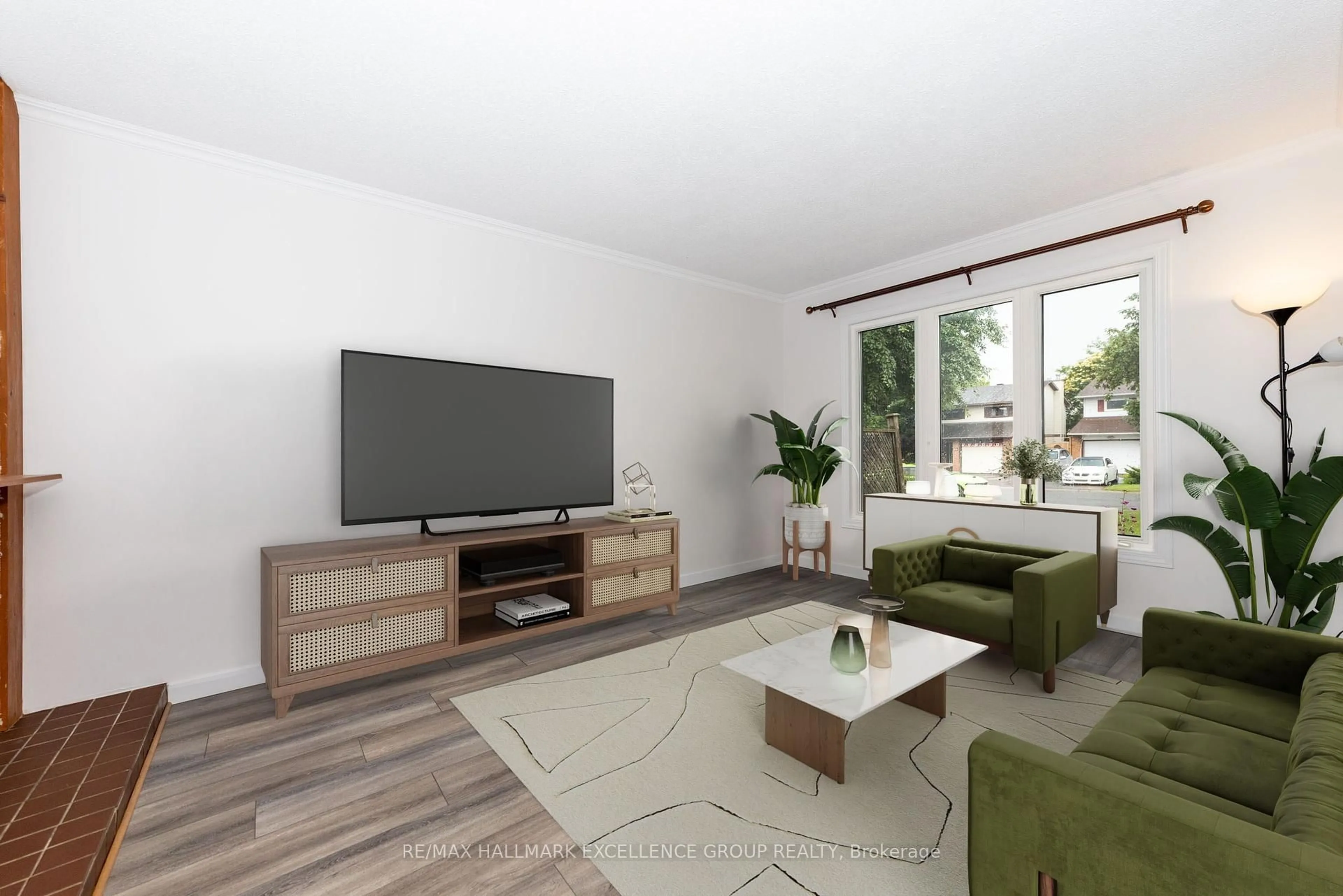 Living room with furniture, wood/laminate floor for 39 Bartley Cres, Ottawa Ontario K2J 1R9