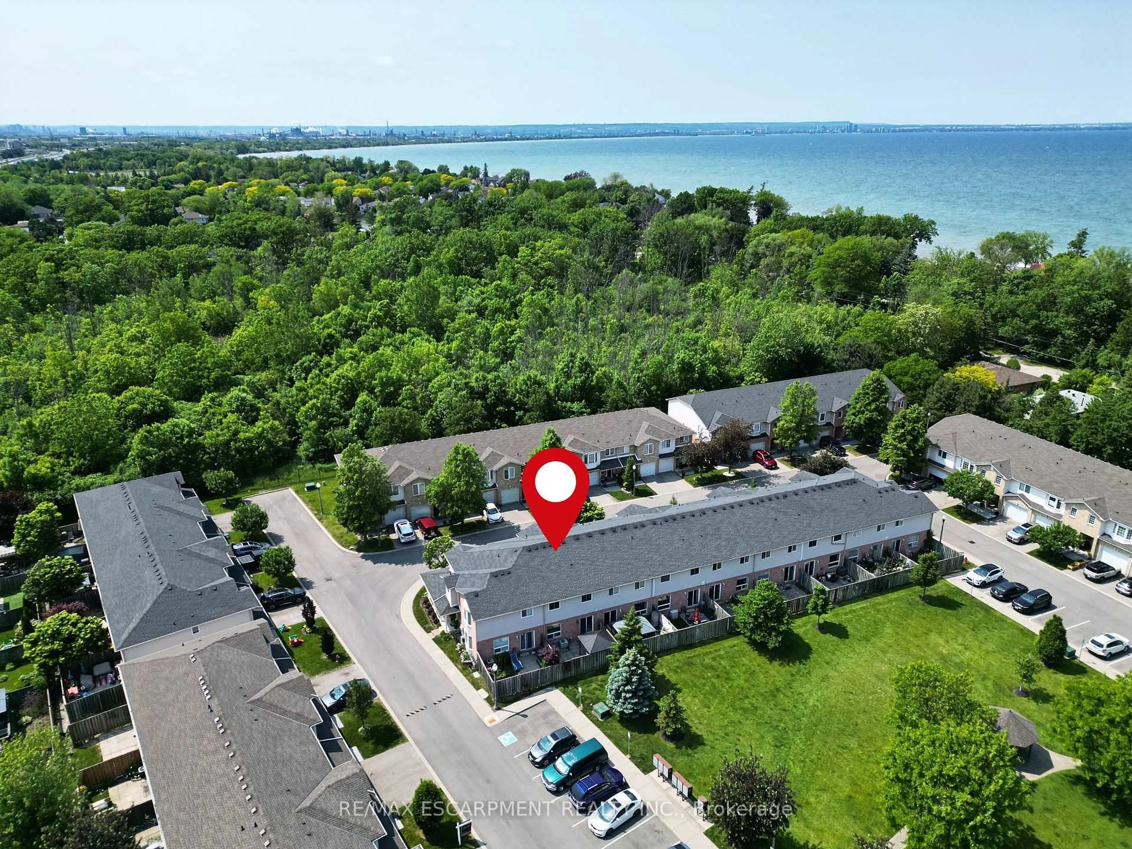 A pic from outside/outdoor area/front of a property/back of a property/a pic from drone, water/lake/river/ocean view for 485 Green Rd #79, Hamilton Ontario L8E 6A9
