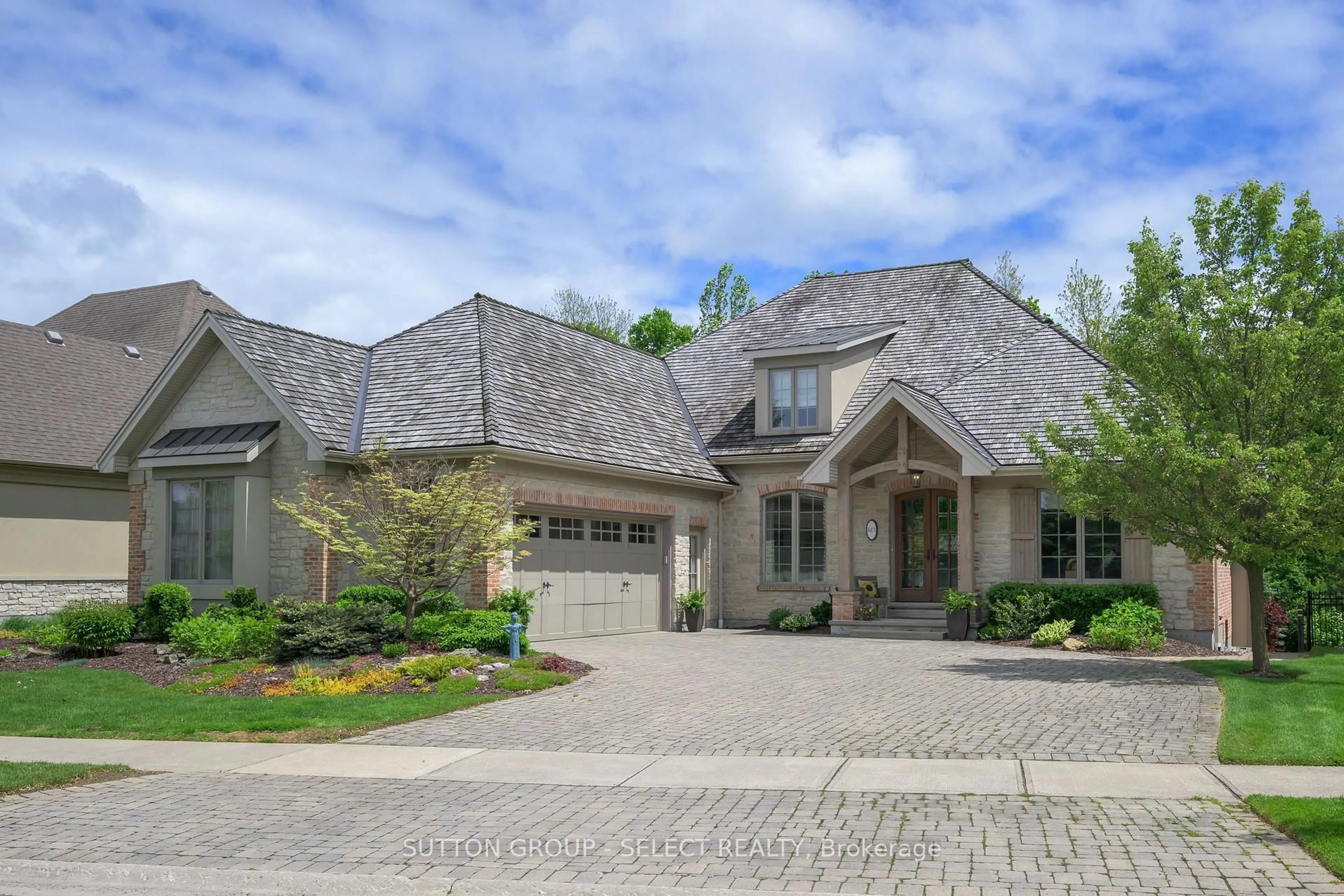 Home with brick exterior material, street for 613 Eagletrace Dr, London North Ontario N6G 0E8