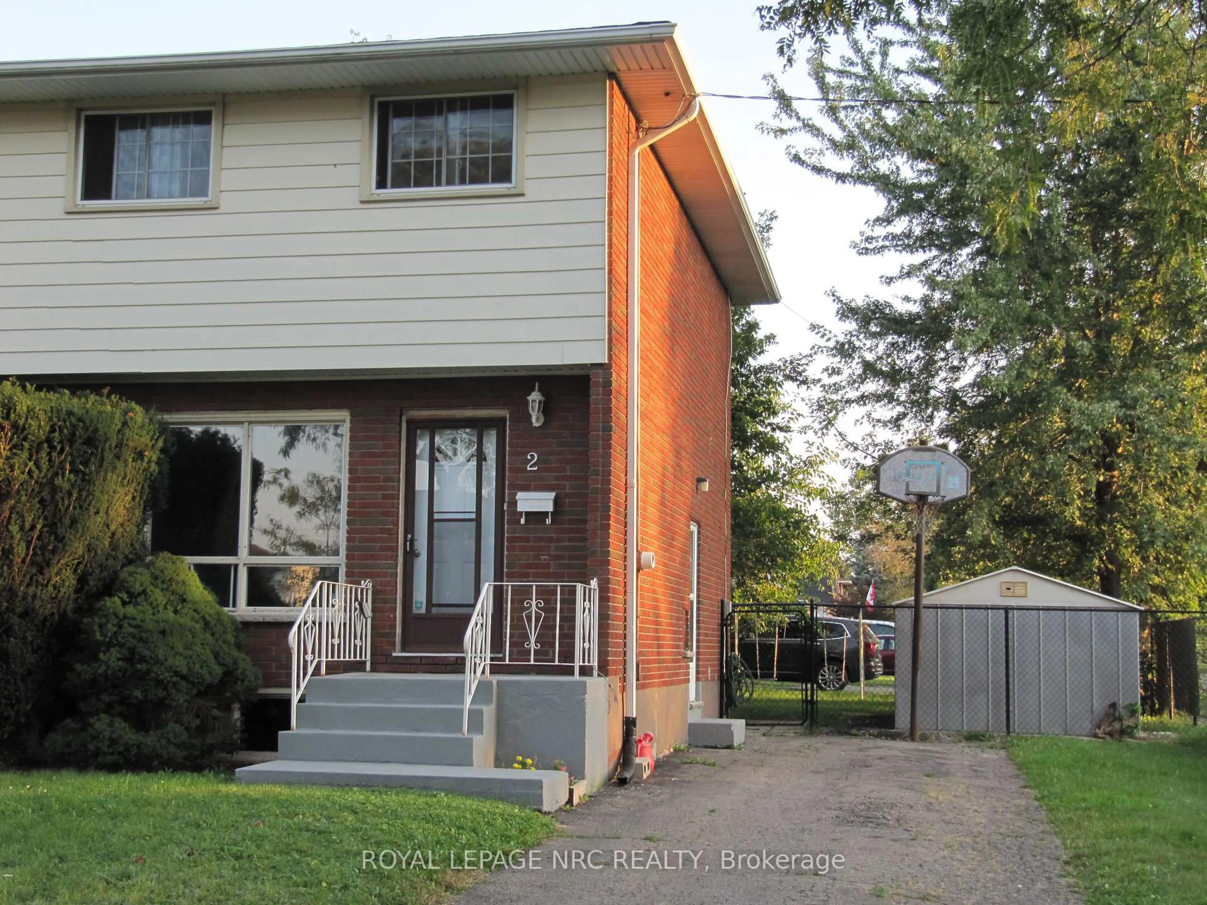 Home with vinyl exterior material, street for 2 Black Knight Rd, St. Catharines Ontario L2N 3C1