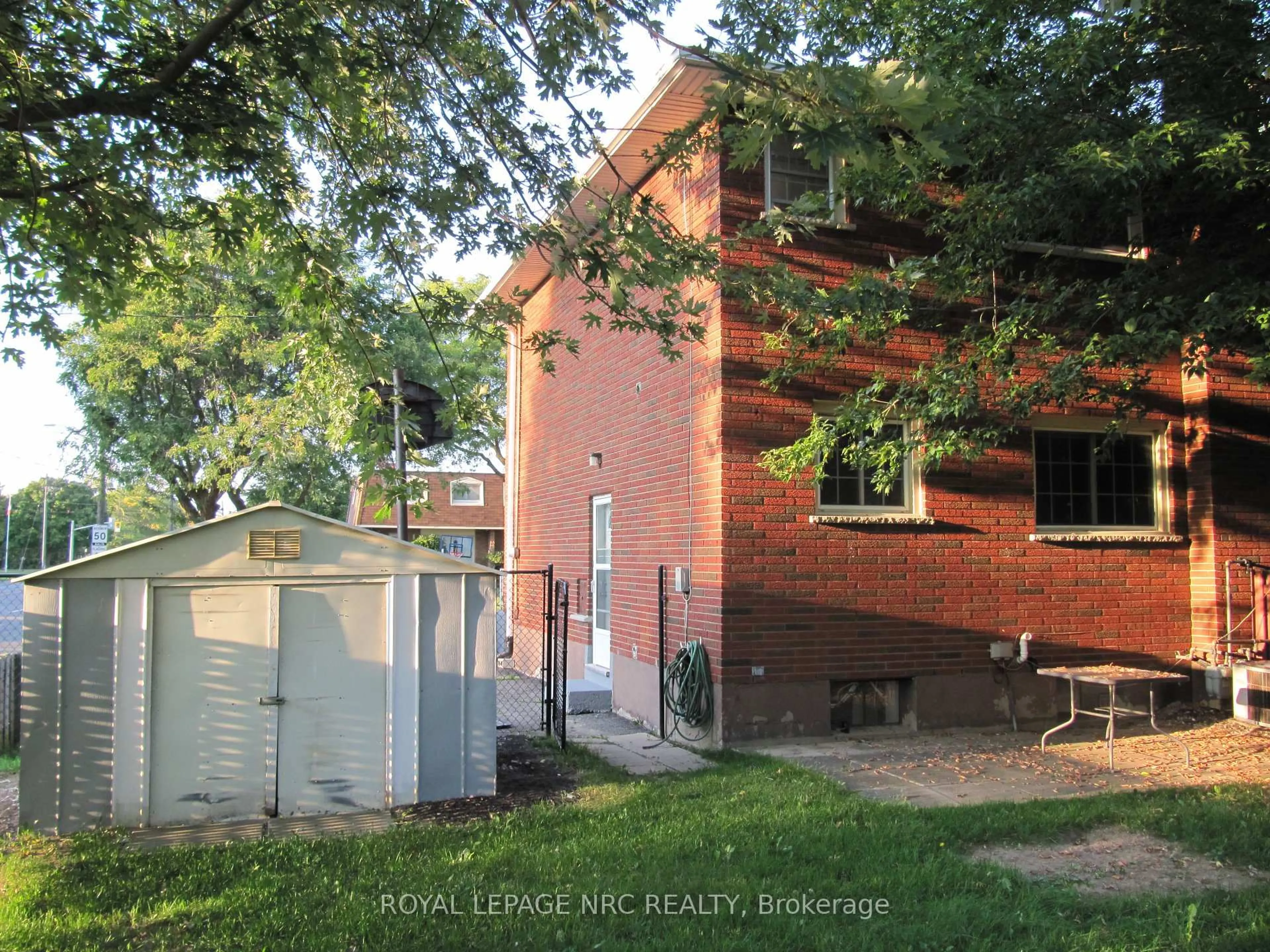 Home with brick exterior material, street for 2 Black Knight Rd, St. Catharines Ontario L2N 3C1