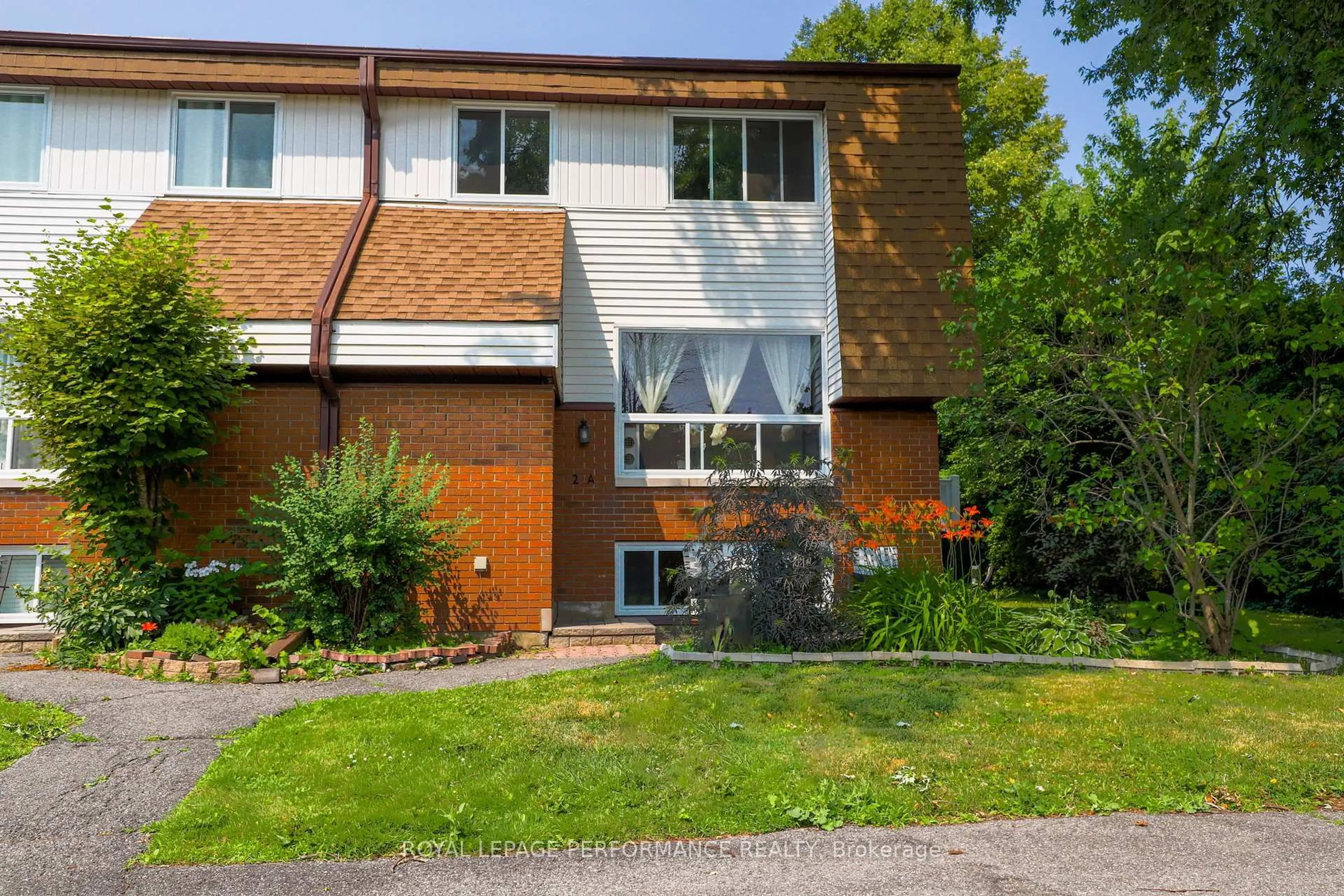 Home with brick exterior material, street for 2 Lovell Lane #A, Ottawa Ontario K2H 9B6