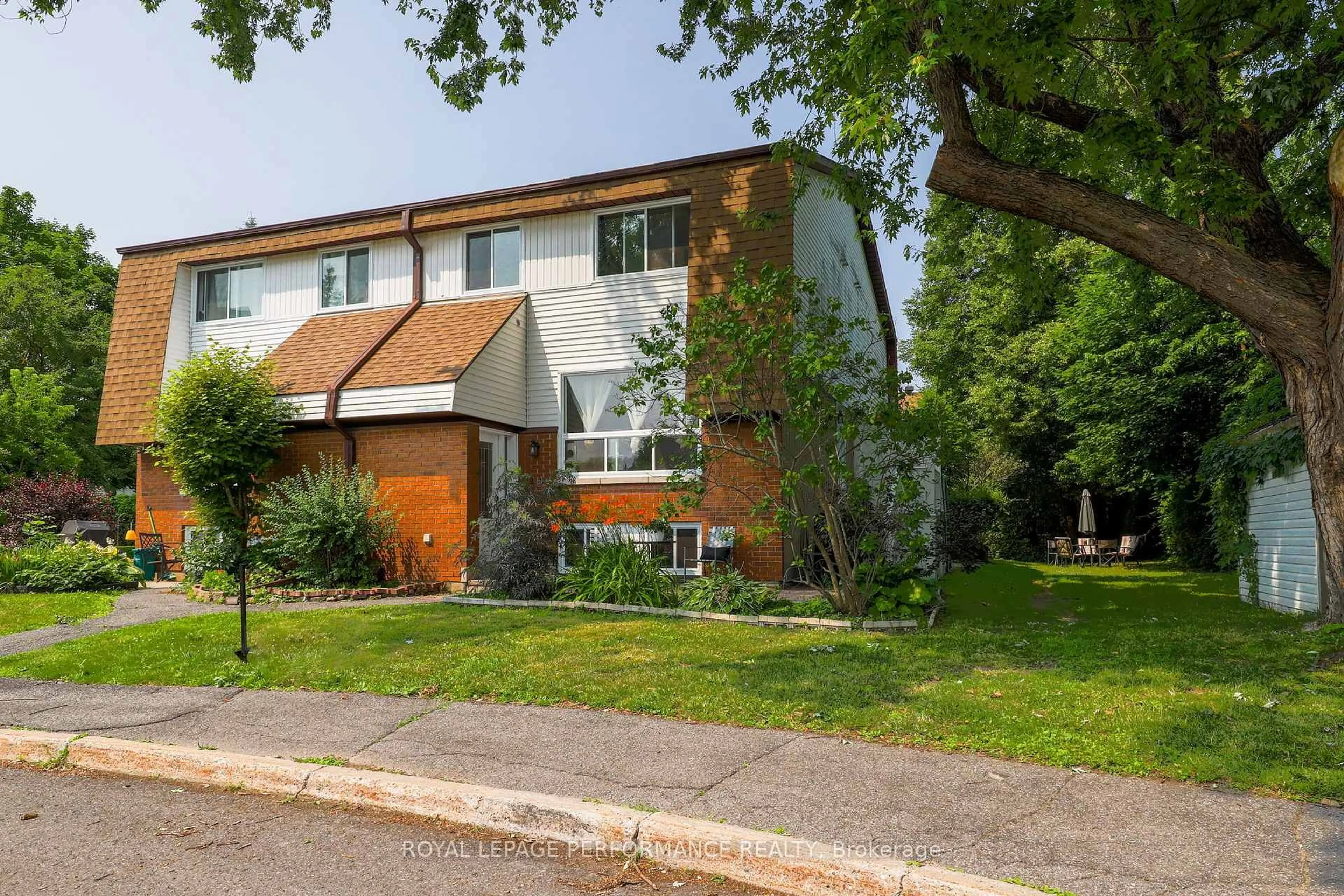 Home with brick exterior material, street for 2 Lovell Lane #A, Ottawa Ontario K2H 9B6