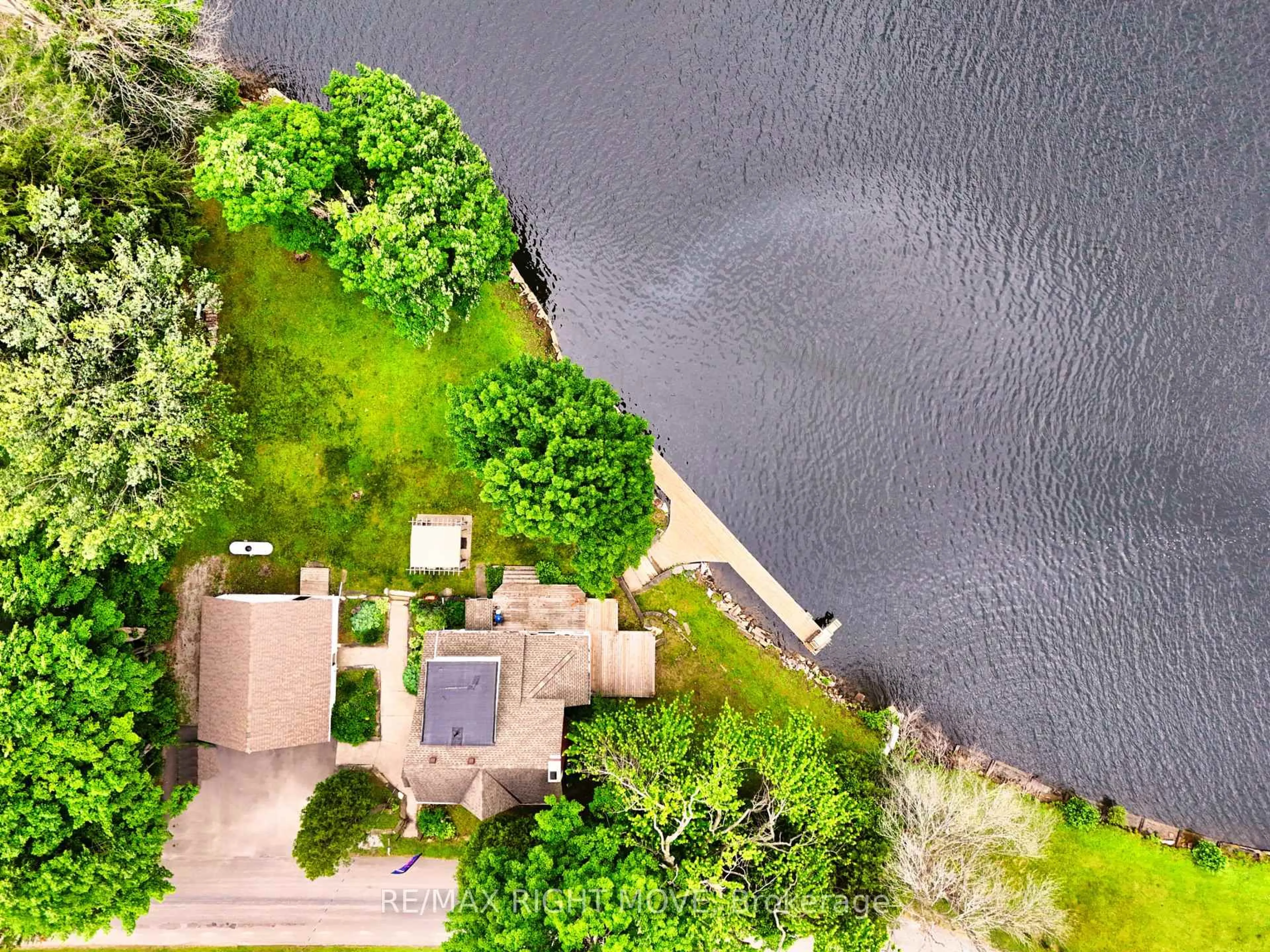 A pic from outside/outdoor area/front of a property/back of a property/a pic from drone, water/lake/river/ocean view for 1012 Cowbell Lane, Gravenhurst Ontario P0E 1N0