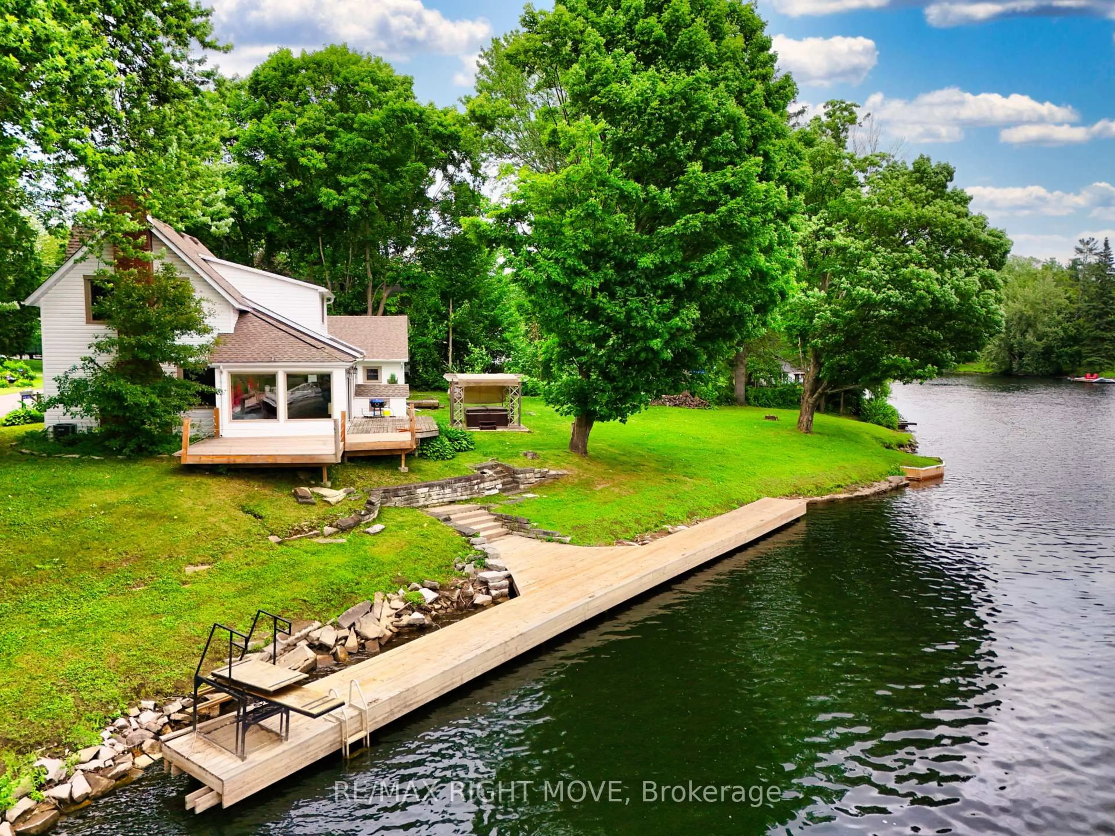 A pic from outside/outdoor area/front of a property/back of a property/a pic from drone, water/lake/river/ocean view for 1012 Cowbell Lane, Gravenhurst Ontario P0E 1N0