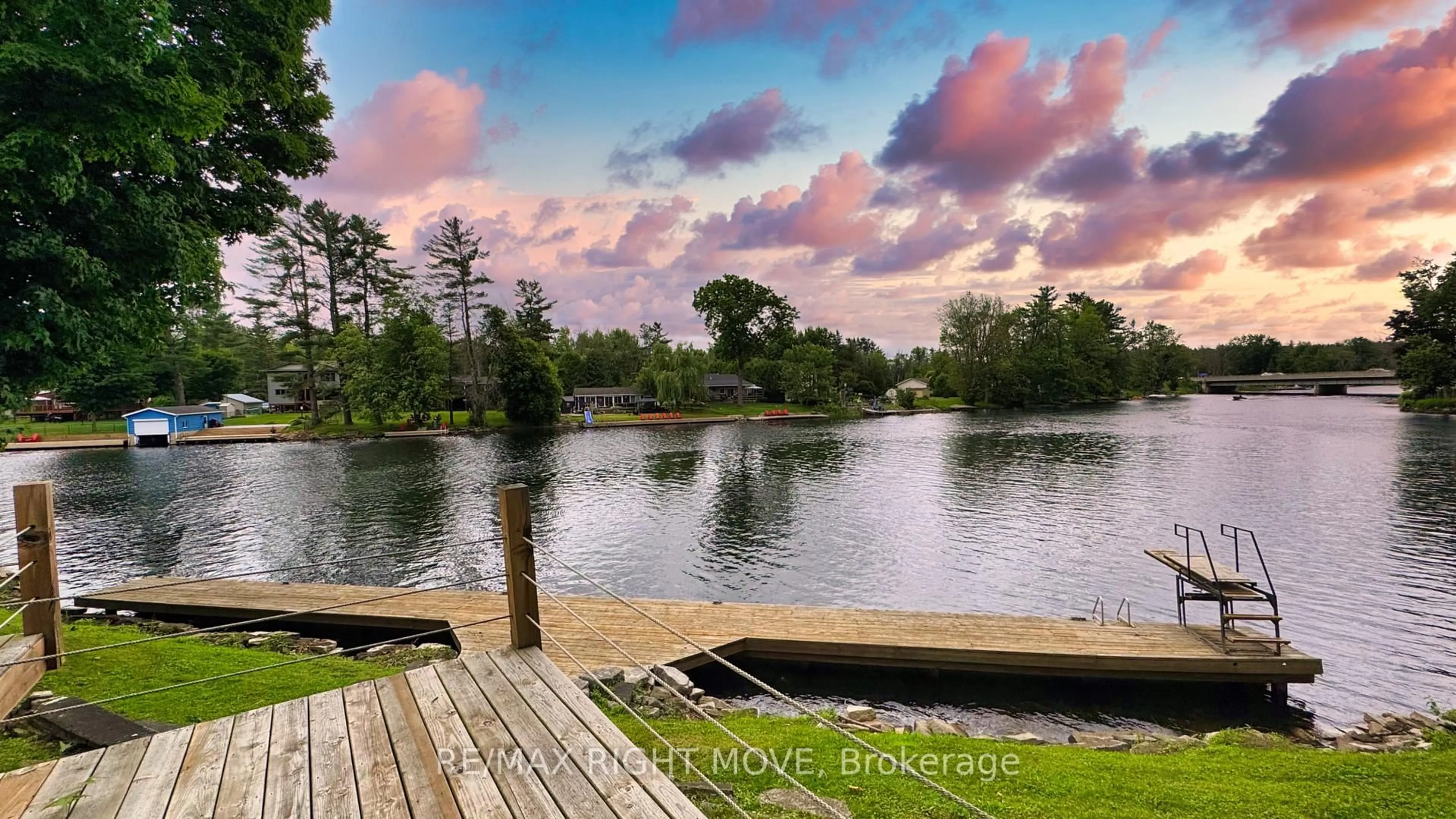 A pic from outside/outdoor area/front of a property/back of a property/a pic from drone, water/lake/river/ocean view for 1012 Cowbell Lane, Gravenhurst Ontario P0E 1N0