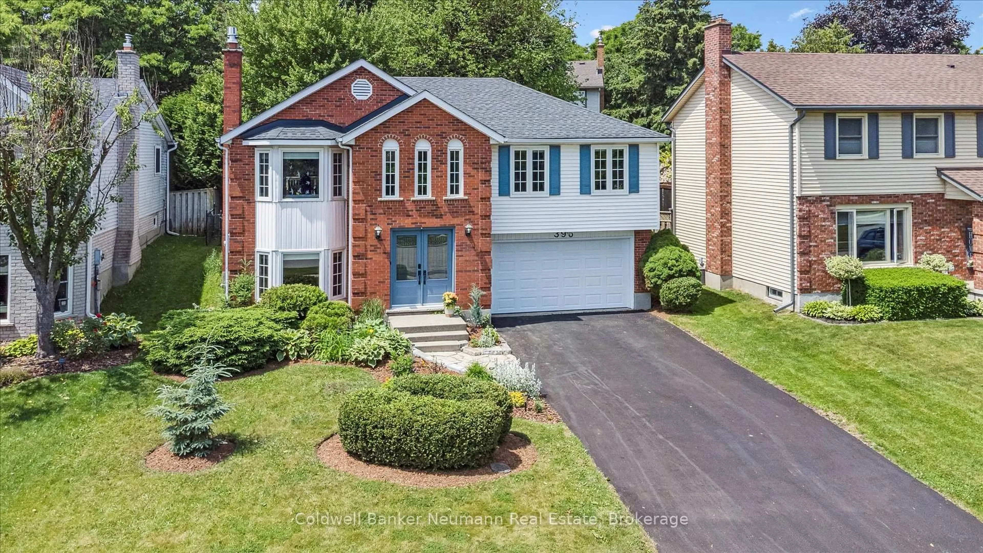 Home with brick exterior material, street for 396 Ironwood Rd, Guelph Ontario N1G 3N8