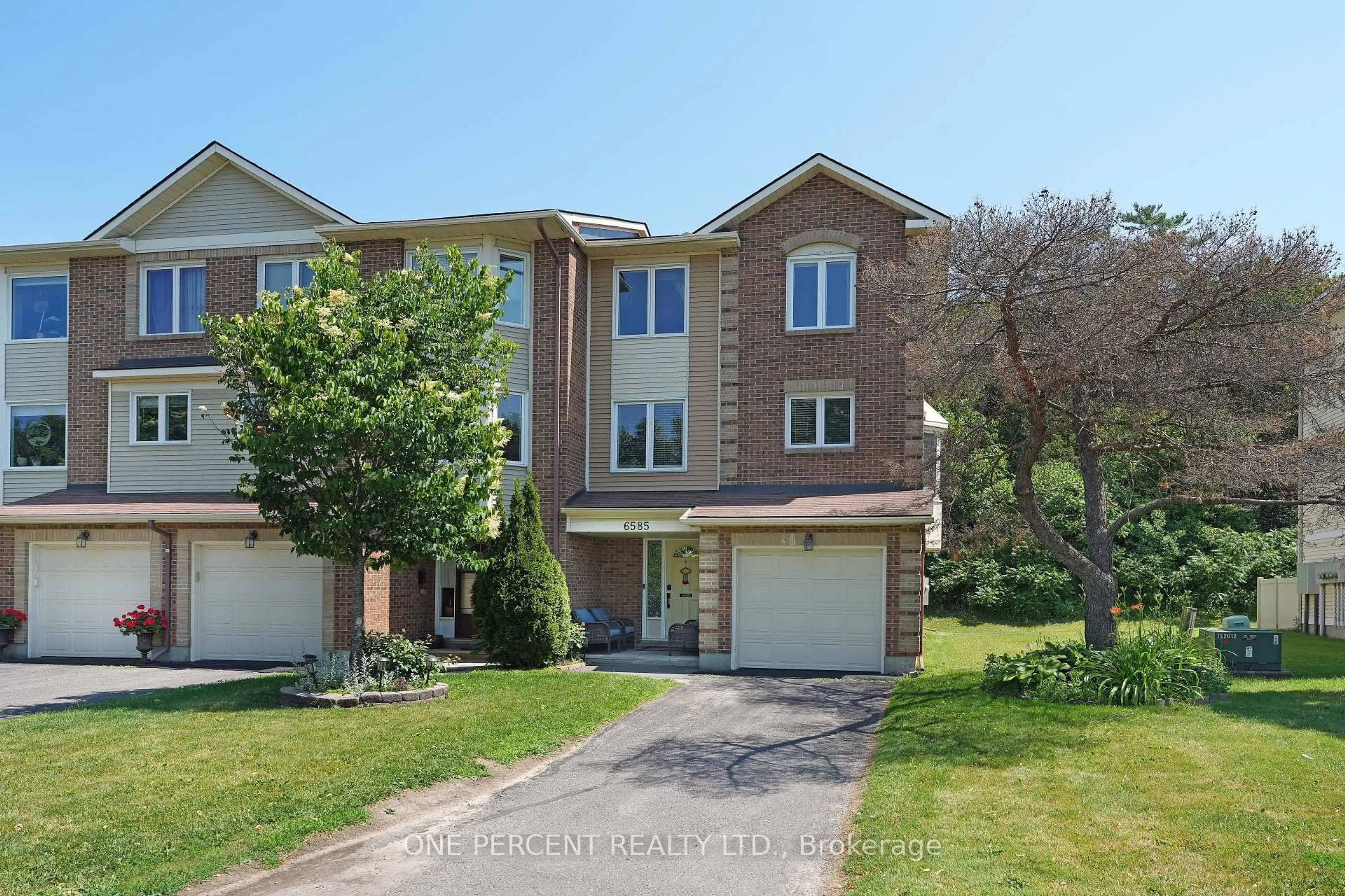 Home with brick exterior material, street for 6585 Bilberry Dr #6585, Ottawa Ontario K1C 4N4