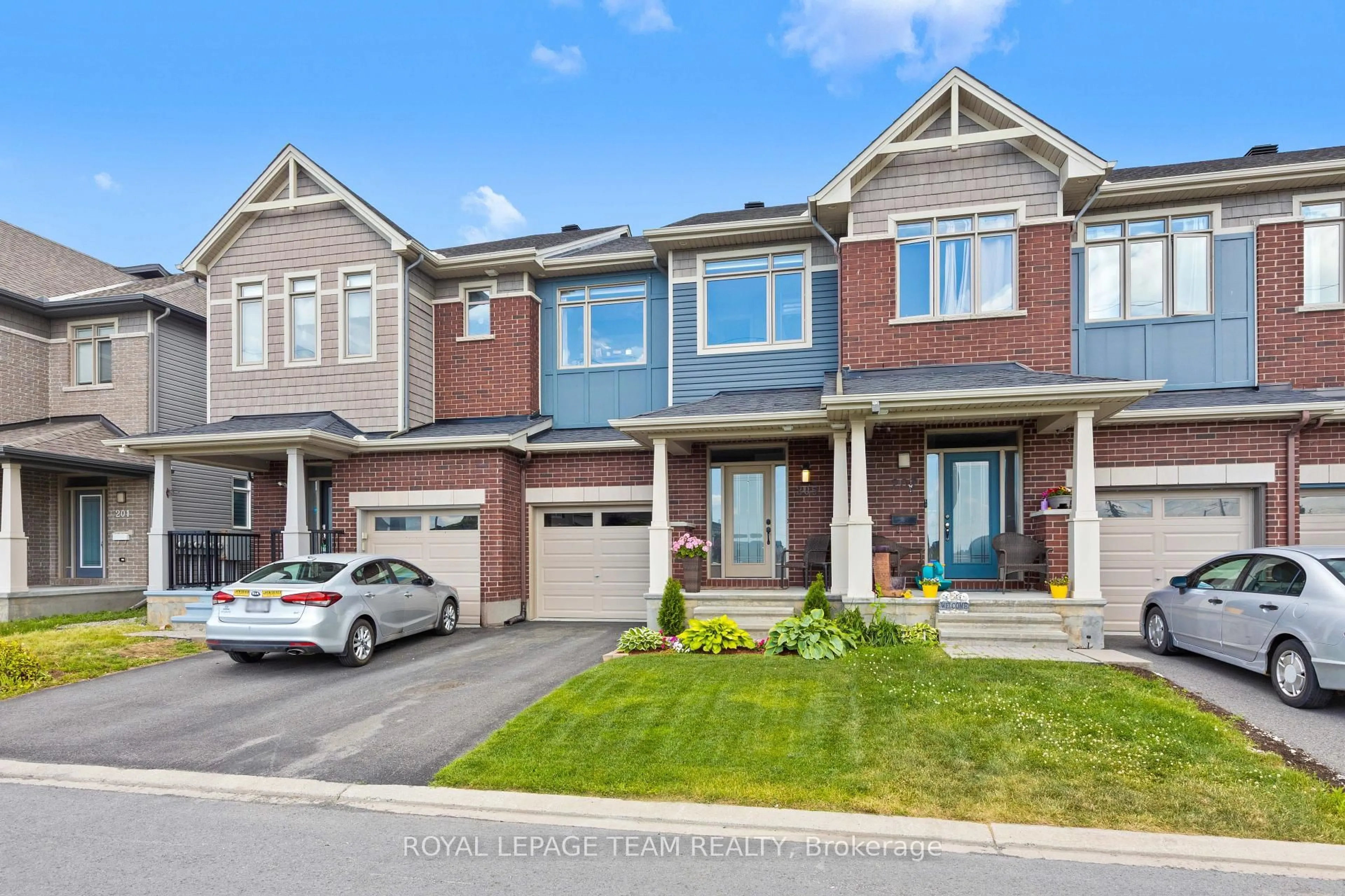 Home with brick exterior material, street for 205 Overberg Way, Ottawa Ontario K2S 0V7