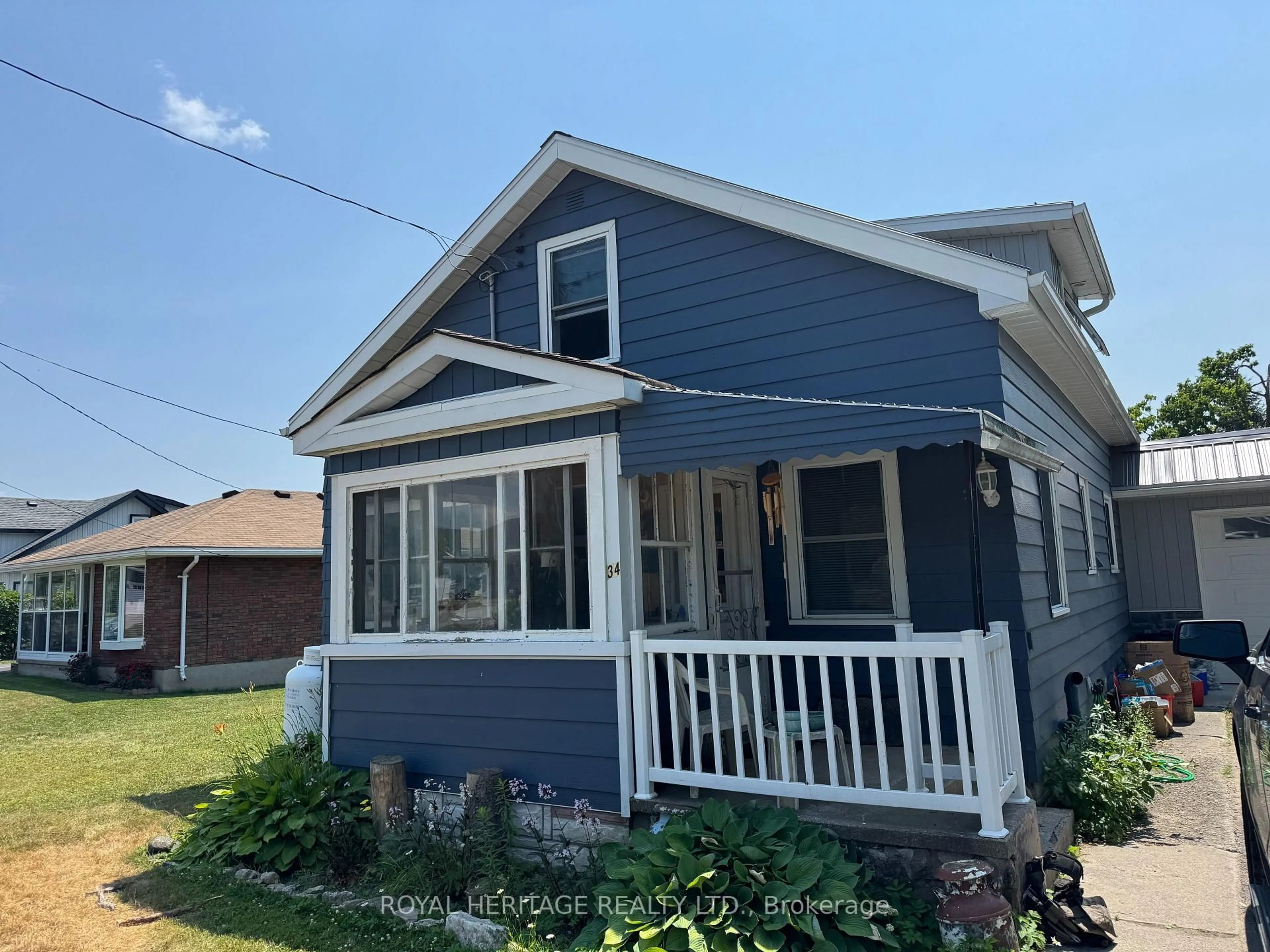 Home with vinyl exterior material, street for 34 Prince St, Kawartha Lakes Ontario K0M 1A0