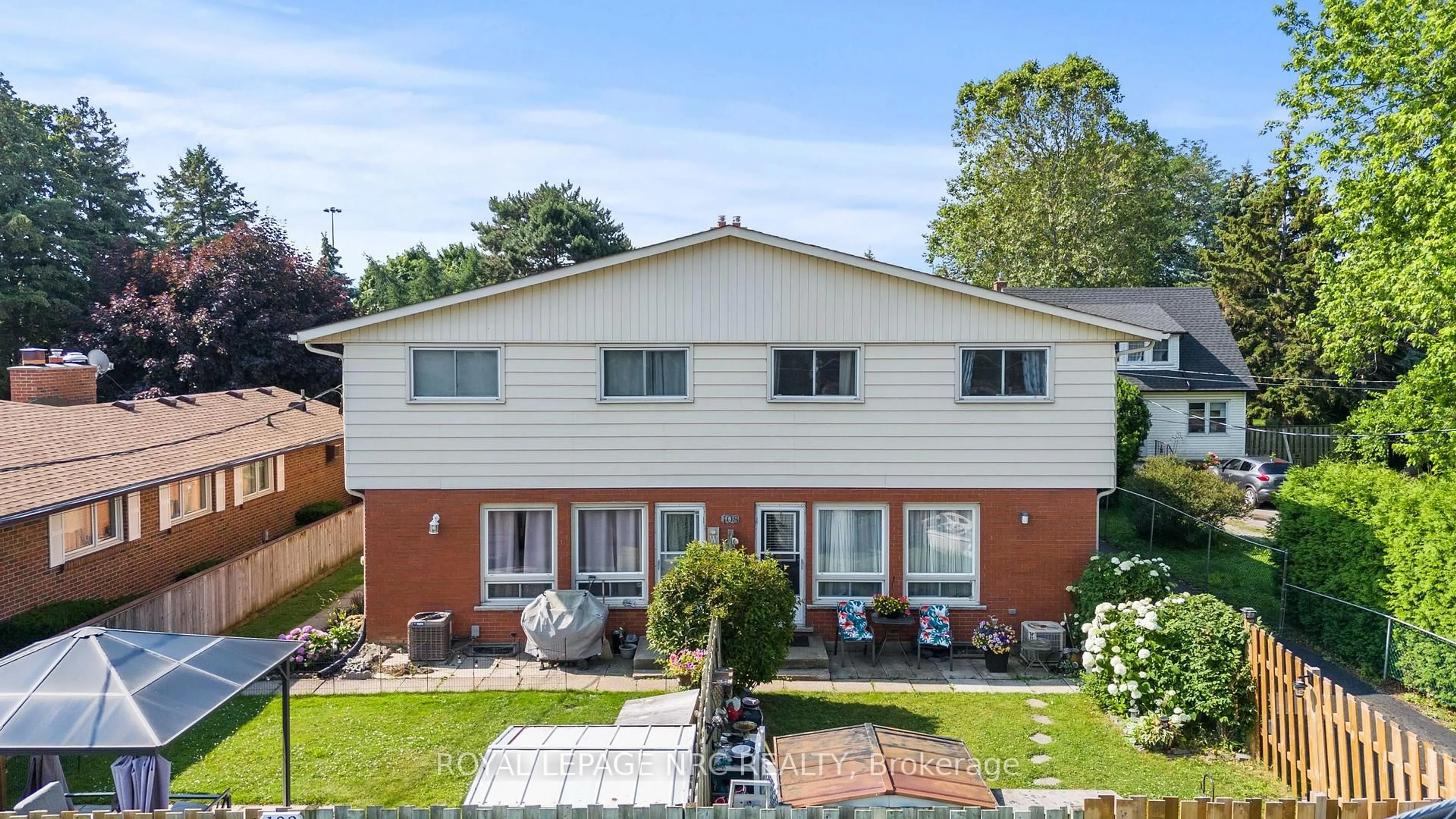 A pic from outside/outdoor area/front of a property/back of a property/a pic from drone, unknown for 108 Scott St, St. Catharines Ontario L2N 1G9