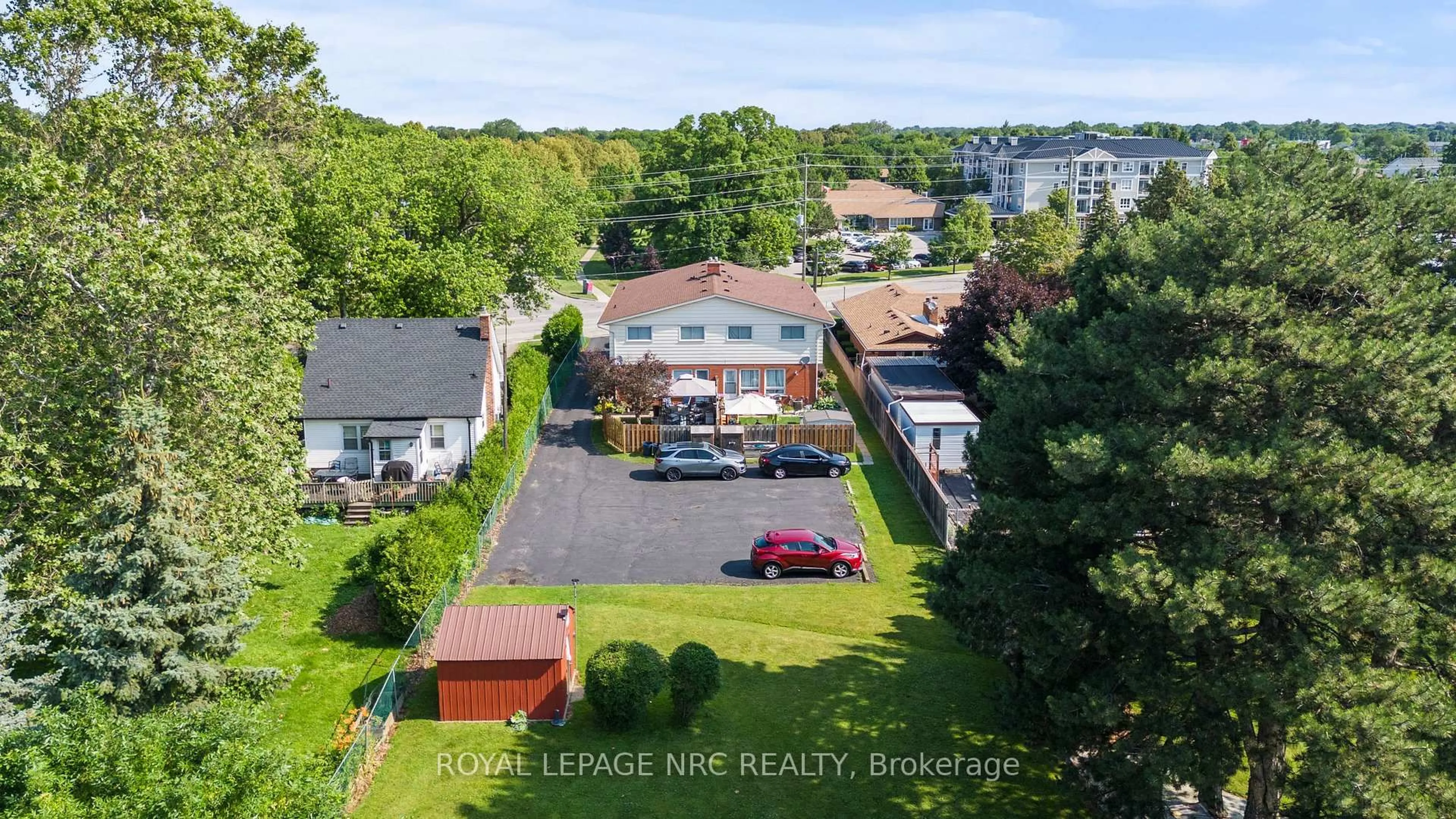 A pic from outside/outdoor area/front of a property/back of a property/a pic from drone, street for 108 Scott St, St. Catharines Ontario L2N 1G9