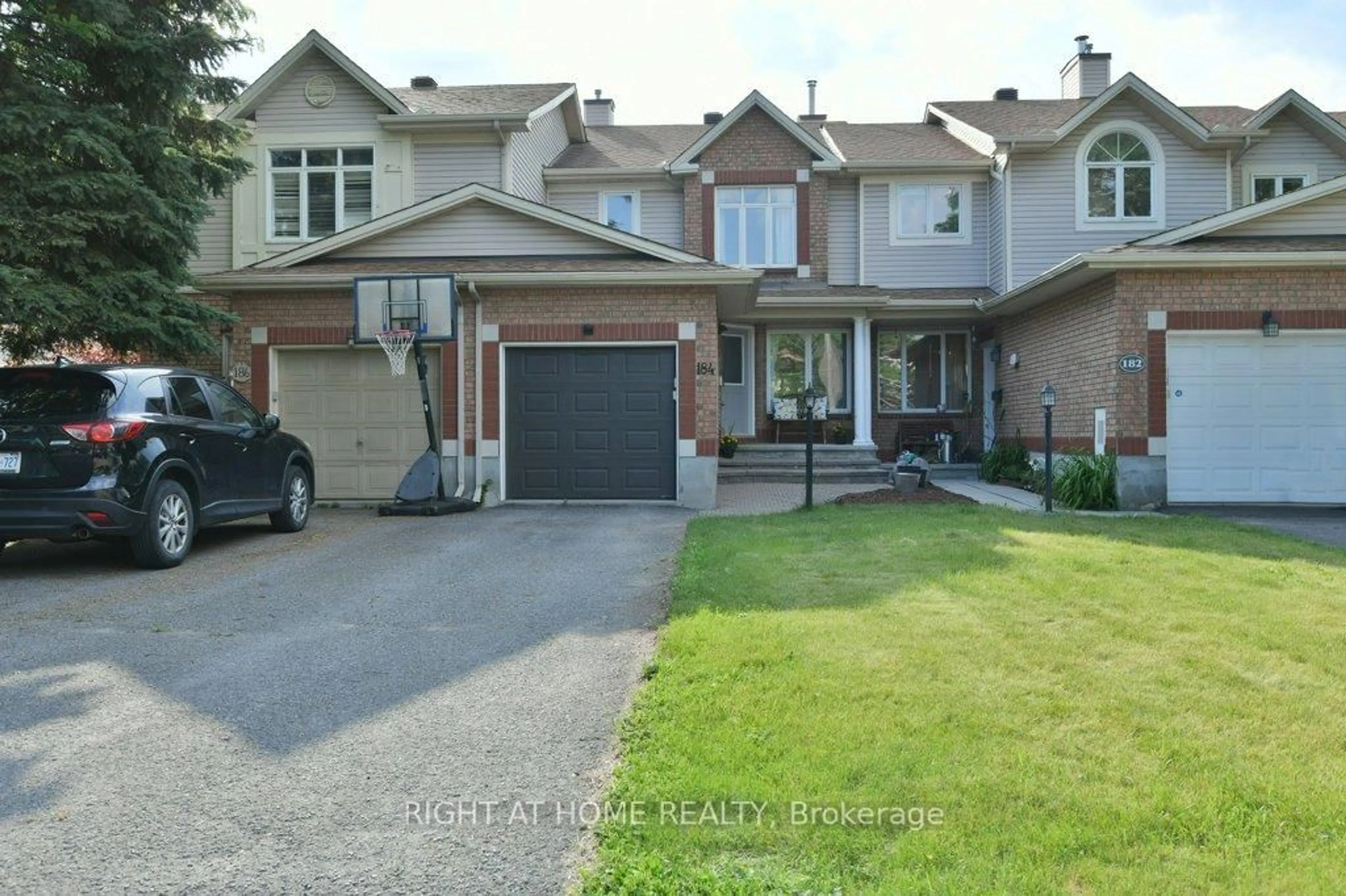 A pic from outside/outdoor area/front of a property/back of a property/a pic from drone, street for 184 Beatrice Dr, Ottawa Ontario K2J 4P1