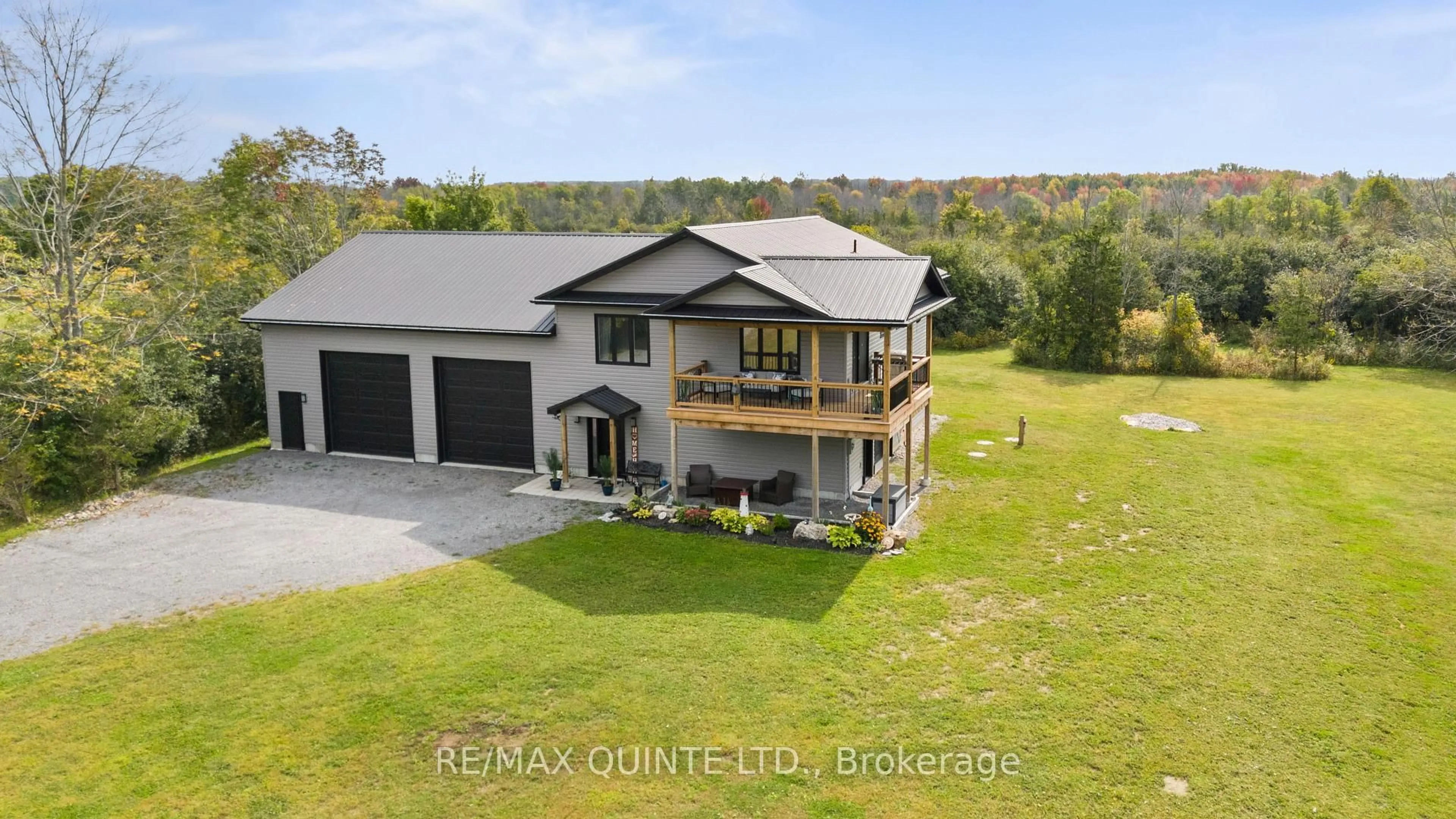 A pic from outside/outdoor area/front of a property/back of a property/a pic from drone, water/lake/river/ocean view for 1467 County Road 19, Prince Edward County Ontario K0K 1T0