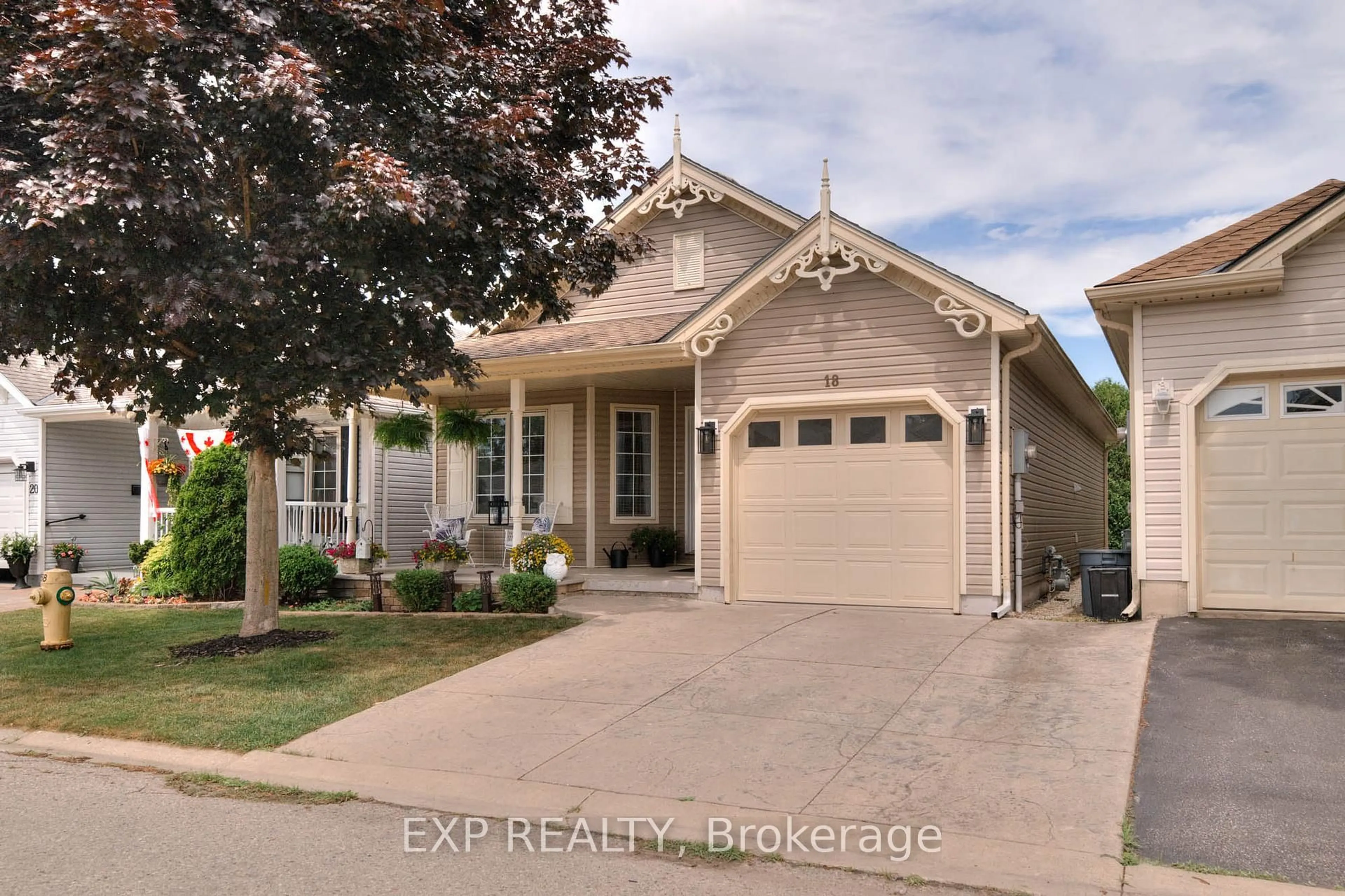 Home with vinyl exterior material, street for 18 Mallard Walk, Norfolk Ontario N0E 1M0