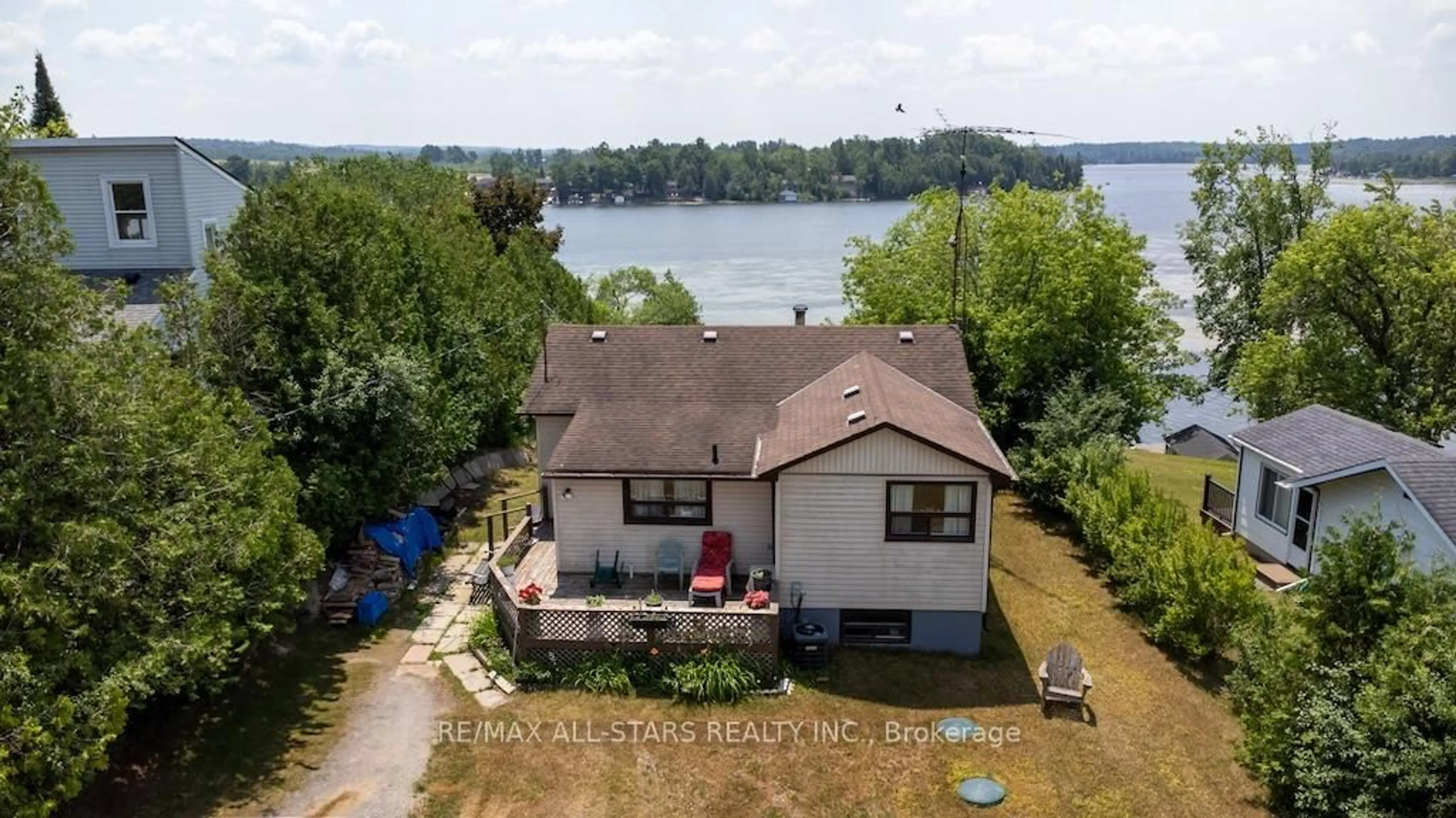 A pic from outside/outdoor area/front of a property/back of a property/a pic from drone, water/lake/river/ocean view for 68 Charlore Park Dr, Kawartha Lakes Ontario K0L 2W0