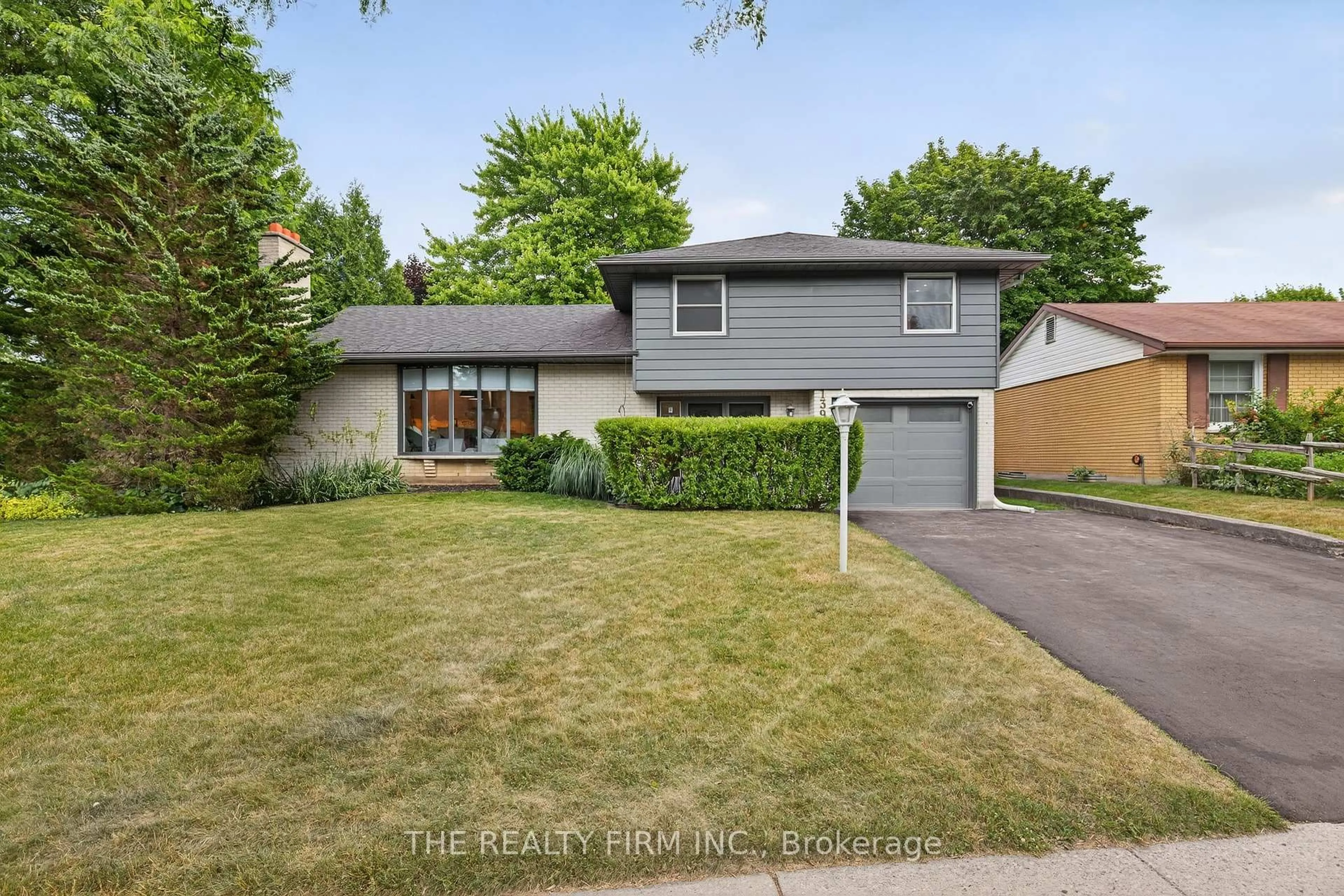Home with vinyl exterior material, street for 1398 Glenora Dr, London North Ontario N5X 1T9