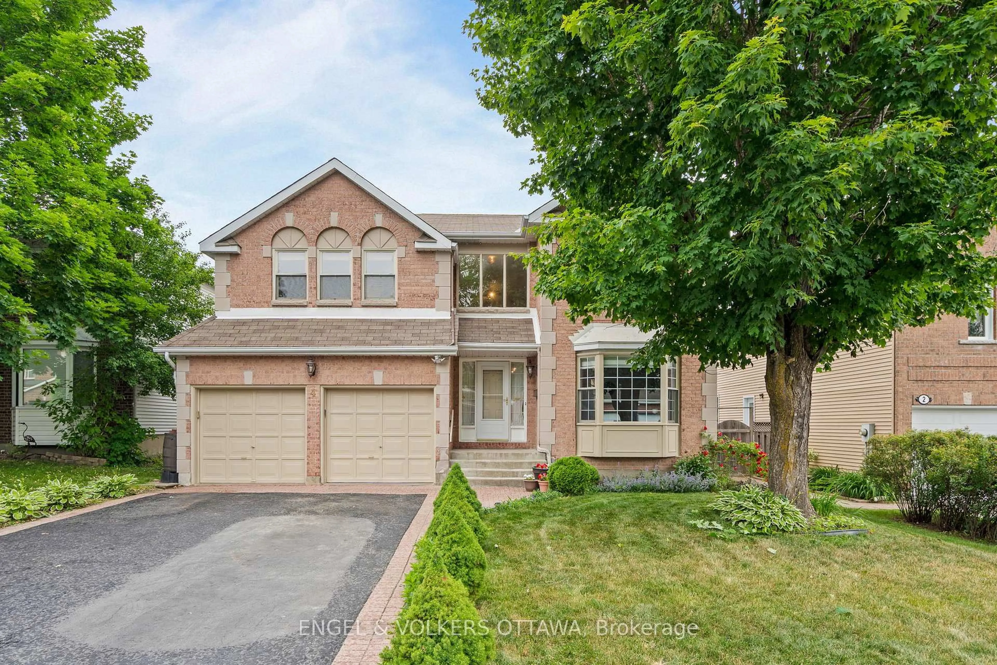 Home with brick exterior material, street for 4 Collingwood Cres, Kanata Ontario K2K 2G6