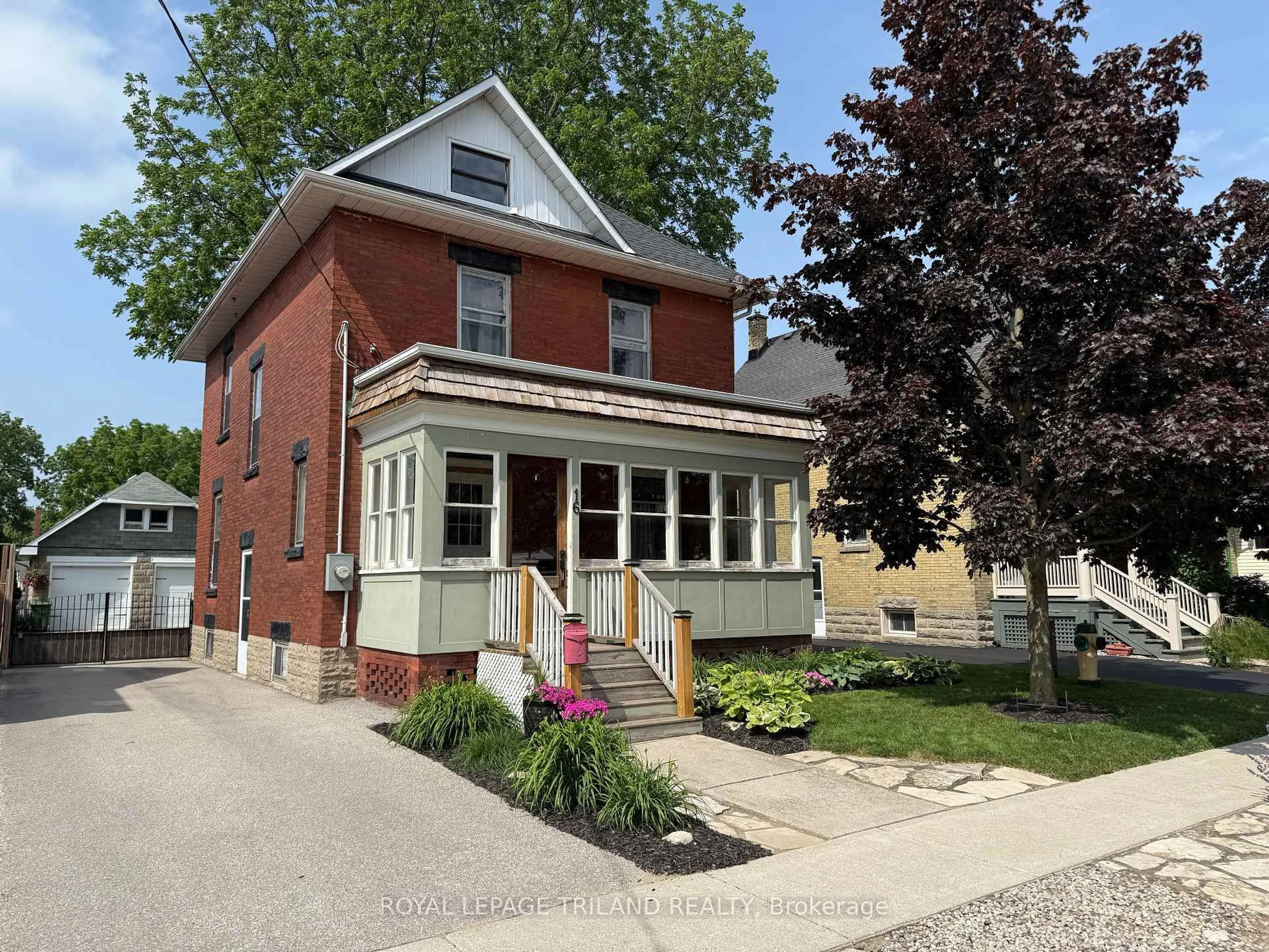 Home with brick exterior material, street for 16 Maple St, St. Thomas Ontario N5R 1Y9
