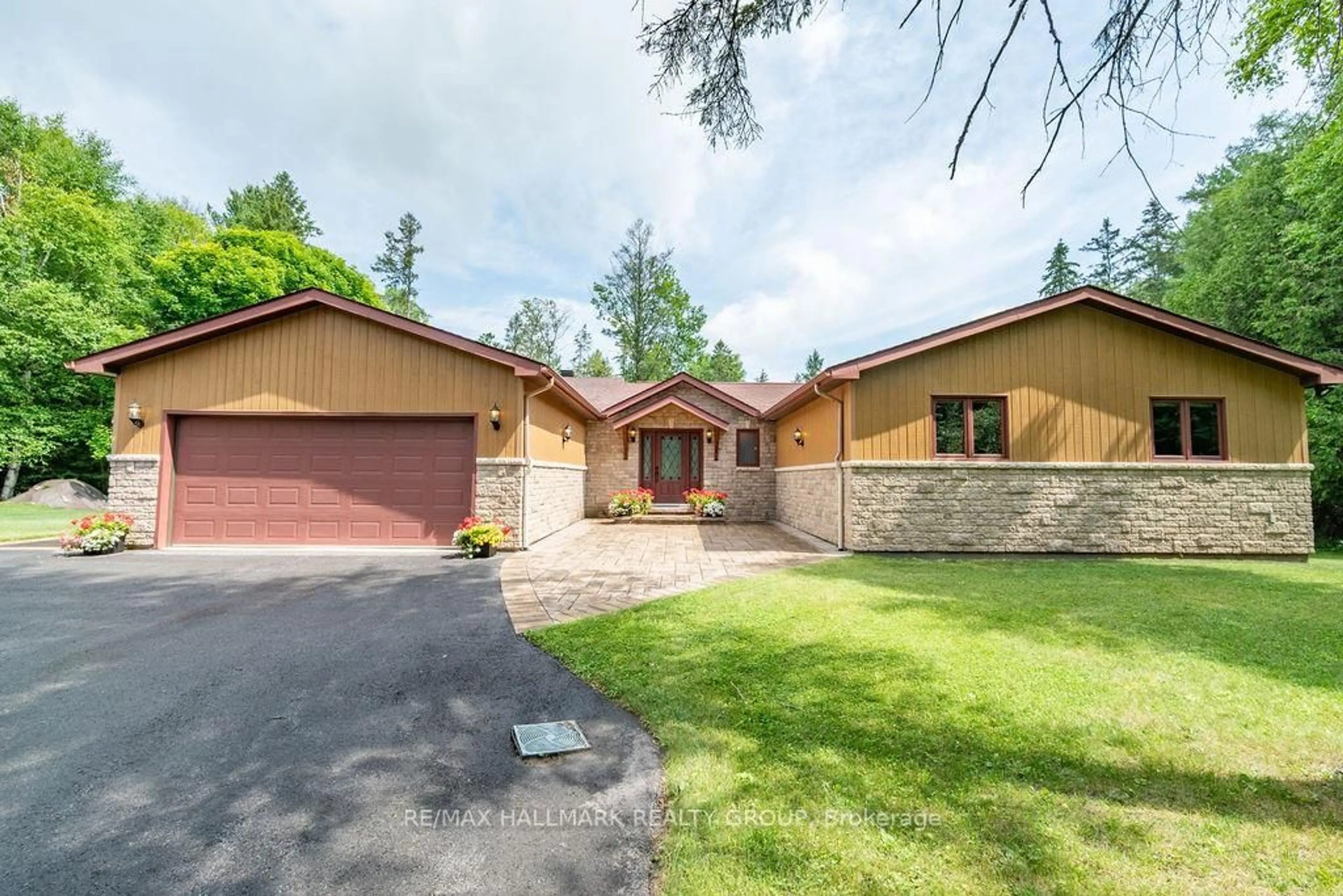 Home with brick exterior material, street for 206 Deerwood Dr, Kinburn Ontario K0A 2H0