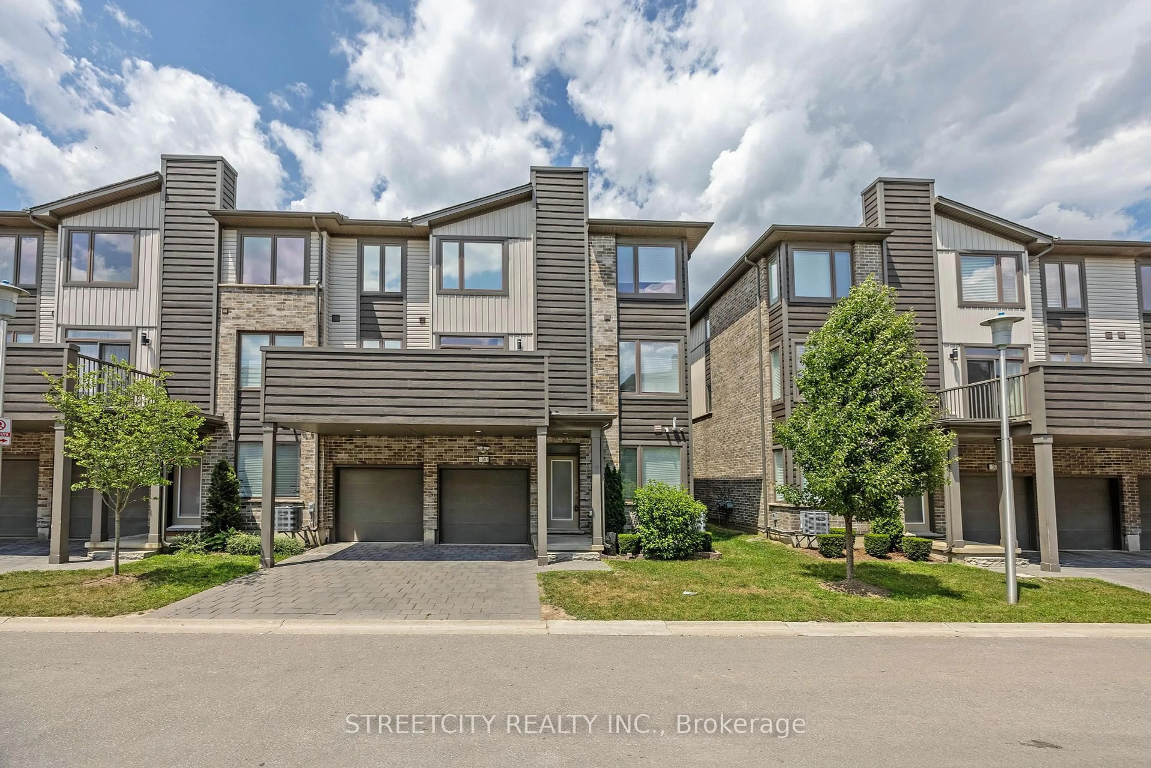 A pic from outside/outdoor area/front of a property/back of a property/a pic from drone, street for 1960 Dalmagarry Rd #34, London North Ontario N6G 0T8