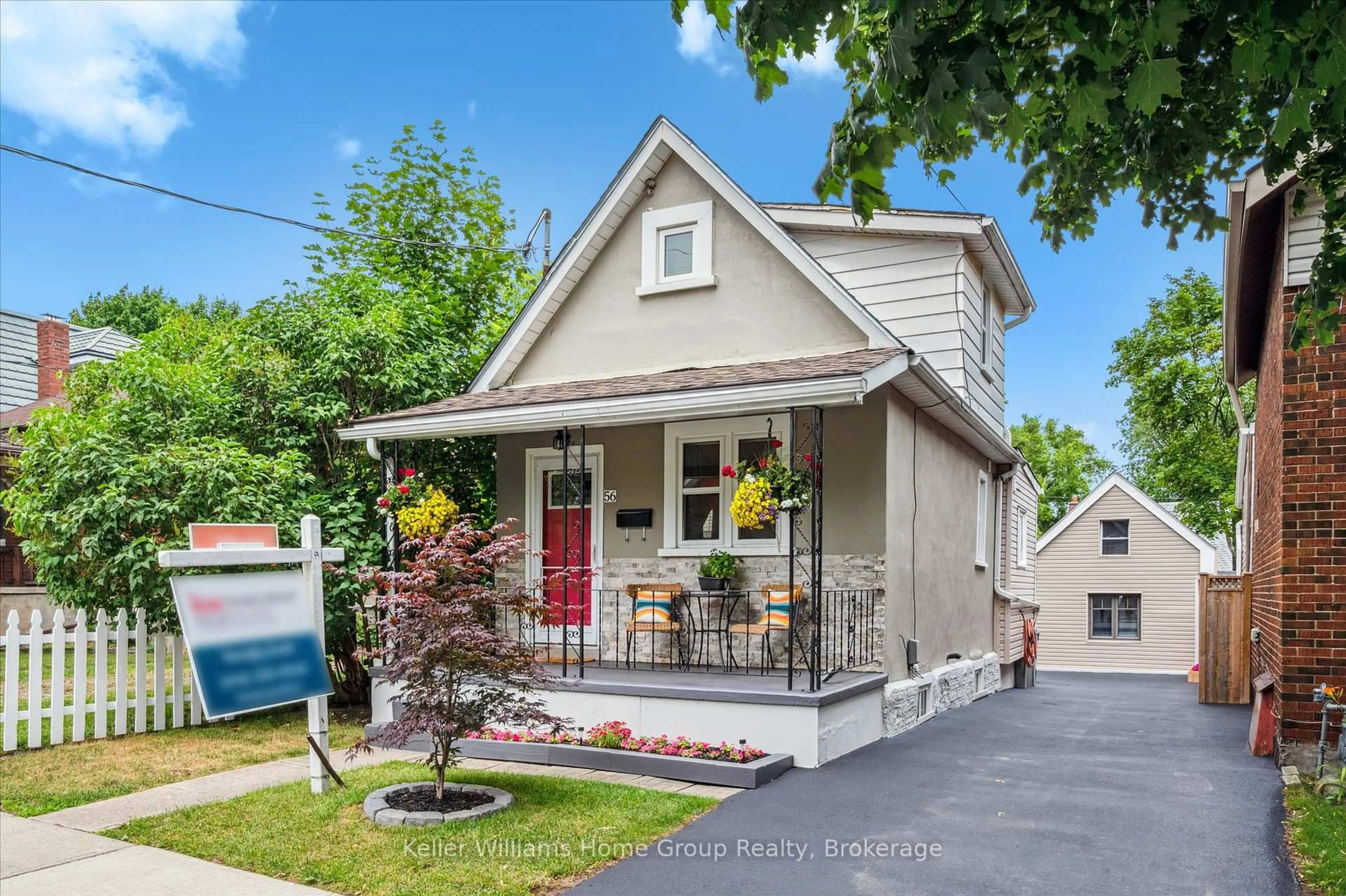 Home with vinyl exterior material, street for 56 Hayes Ave, Guelph Ontario N1E 5V8