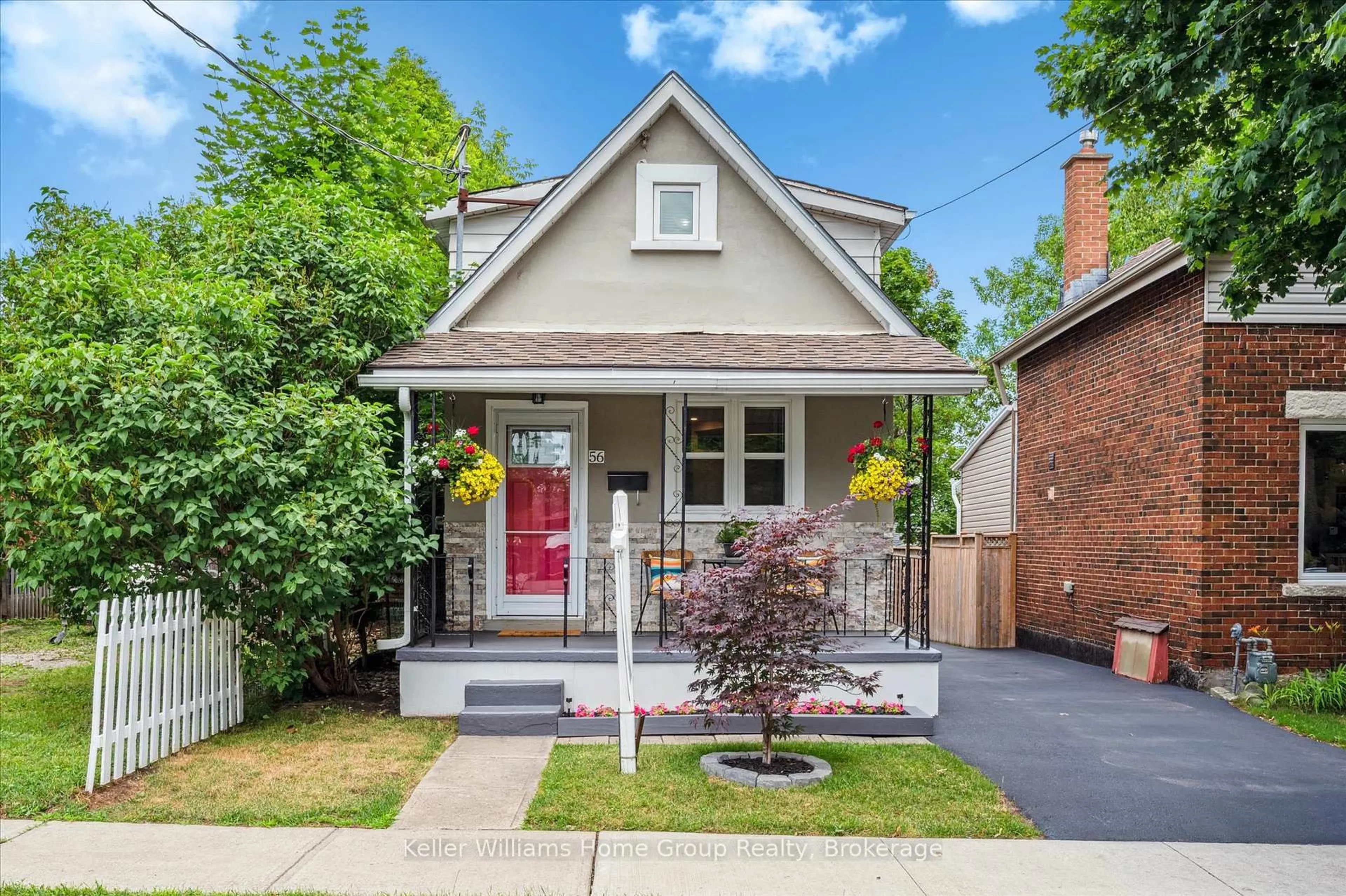 Home with brick exterior material, street for 56 Hayes Ave, Guelph Ontario N1E 5V8
