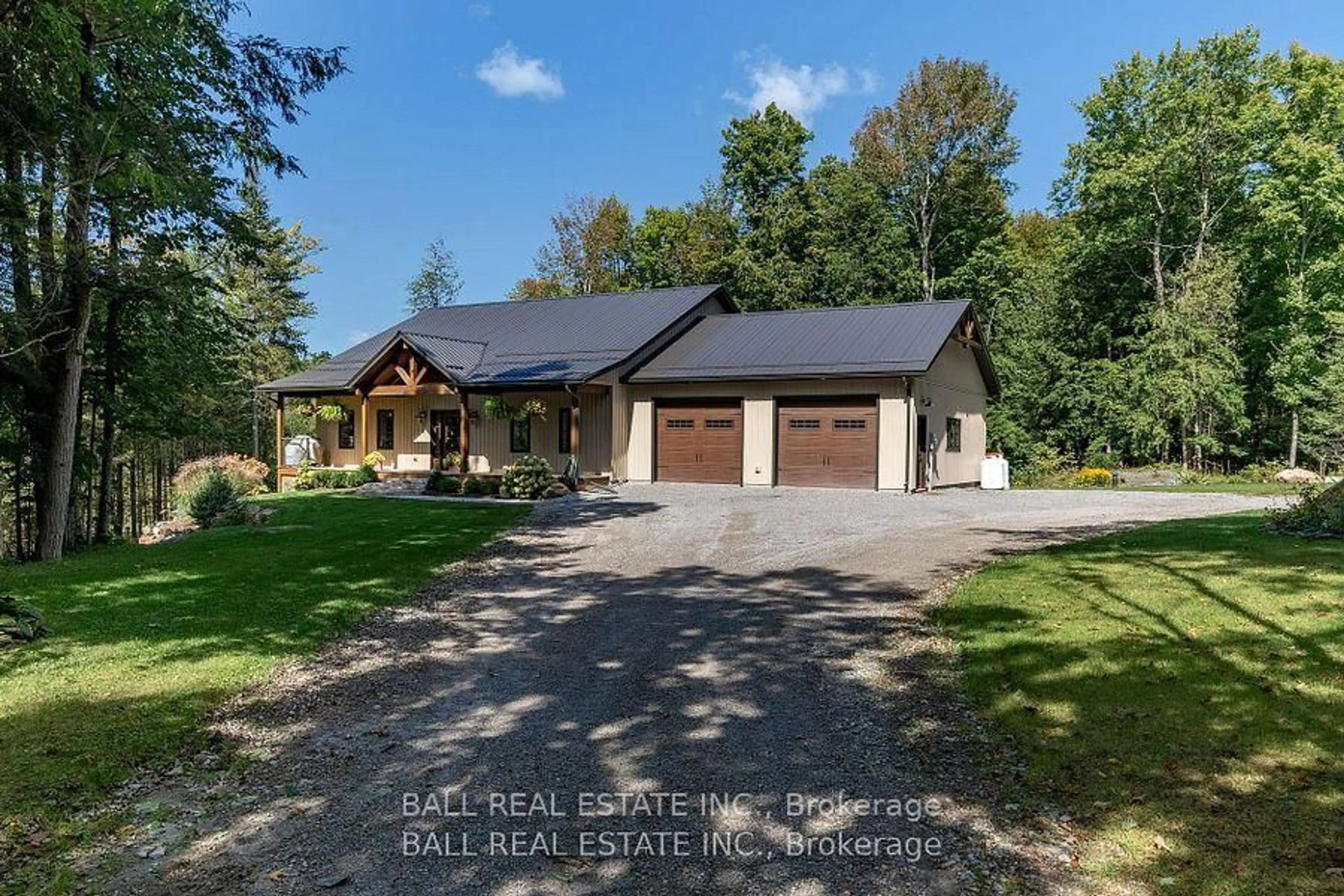 A pic from outside/outdoor area/front of a property/back of a property/a pic from drone, unknown for 201 Northern Ave, Trent Lakes Ontario K0M 1A0