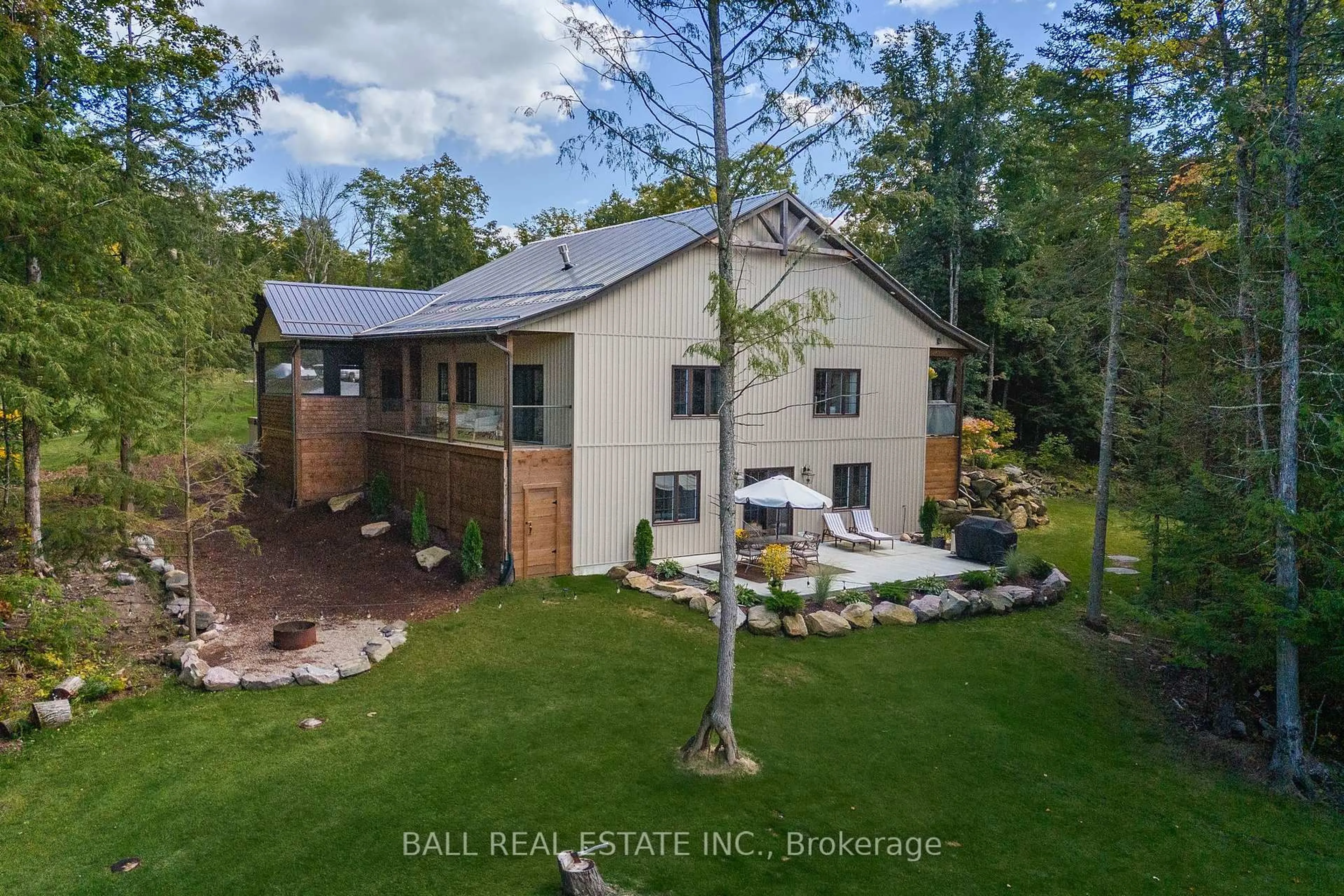 A pic from outside/outdoor area/front of a property/back of a property/a pic from drone, unknown for 201 Northern Ave, Trent Lakes Ontario K0M 1A0