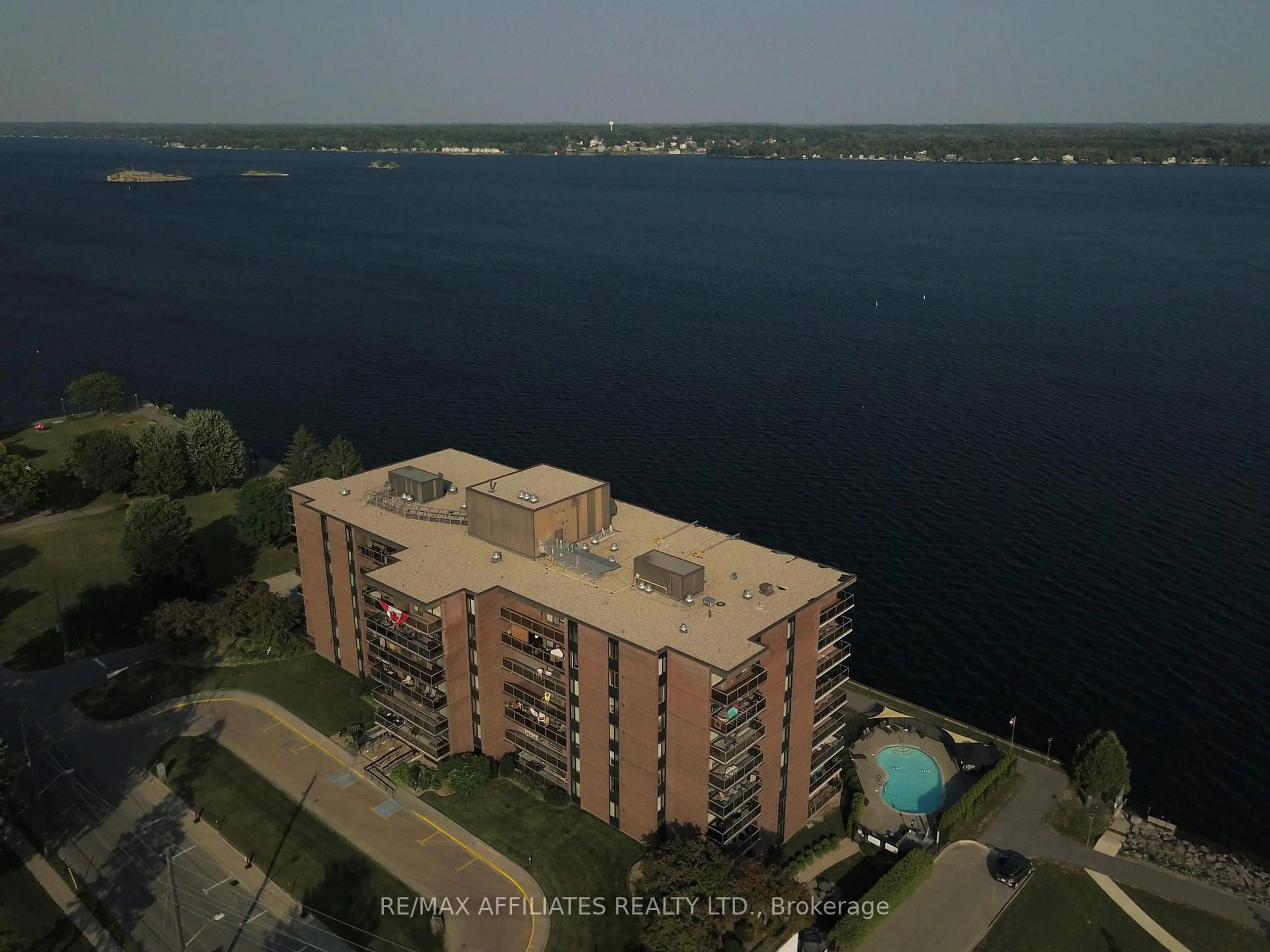 A pic from outside/outdoor area/front of a property/back of a property/a pic from drone, water/lake/river/ocean view for 55 Water St #504, Brockville Ontario K6V 1A3