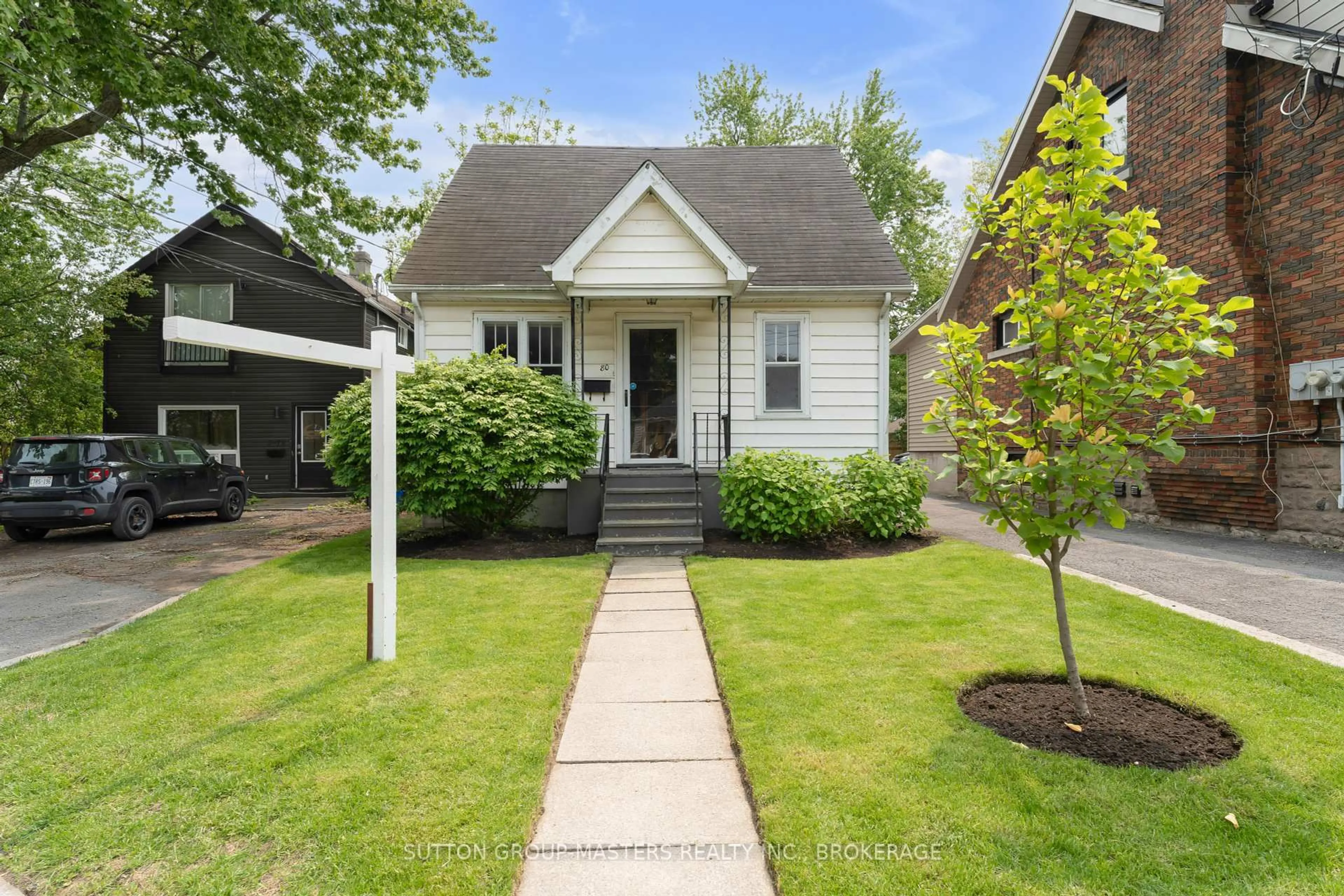 Home with vinyl exterior material, street for 80 Durham Street, Kingston Ontario K7L 1J4