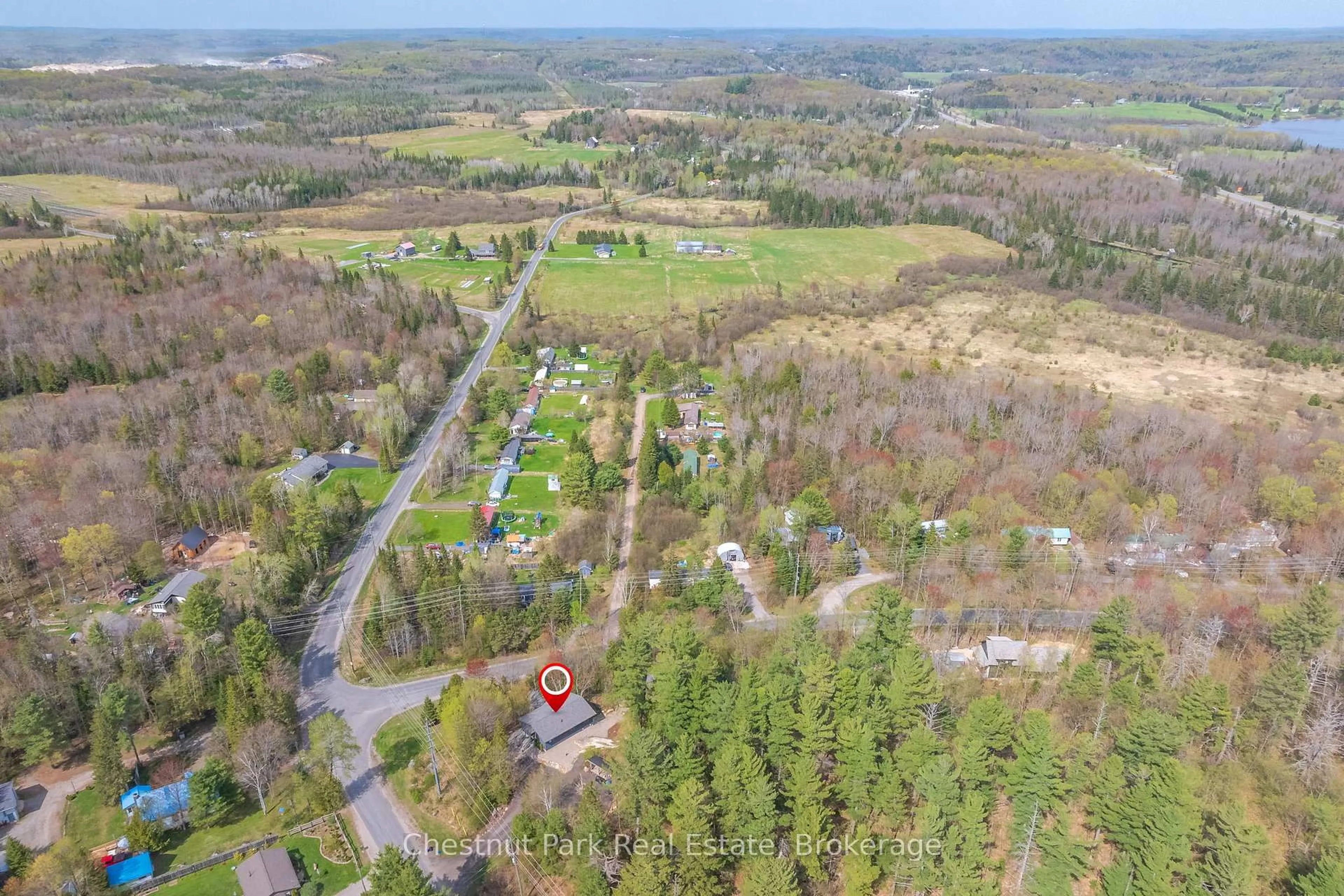 A pic from outside/outdoor area/front of a property/back of a property/a pic from drone, forest/trees view for 1205 Old Muskoka Rd, Huntsville Ontario P0B 1M0