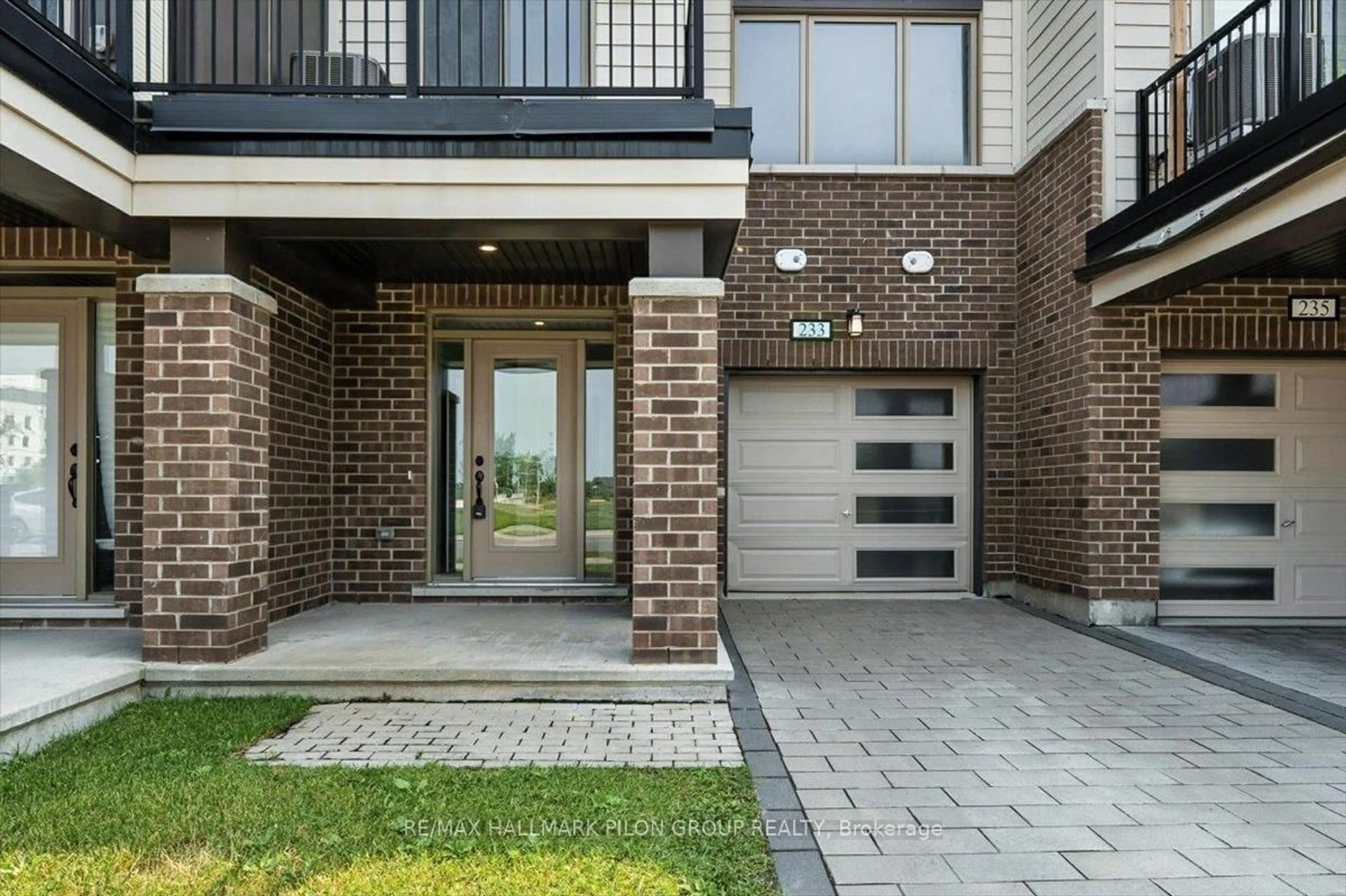 Home with brick exterior material, street for 233 Squadron Cres, Ottawa Ontario K1K 5A4