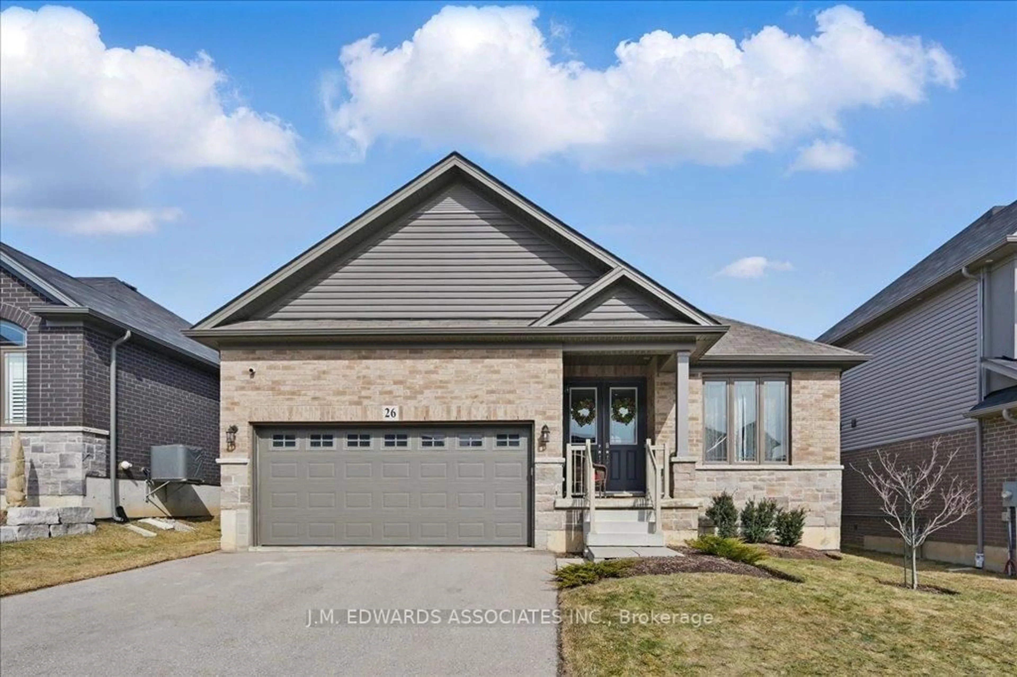Home with brick exterior material, street for 26 McGovern Lane, Brant Ontario N3L 0K3