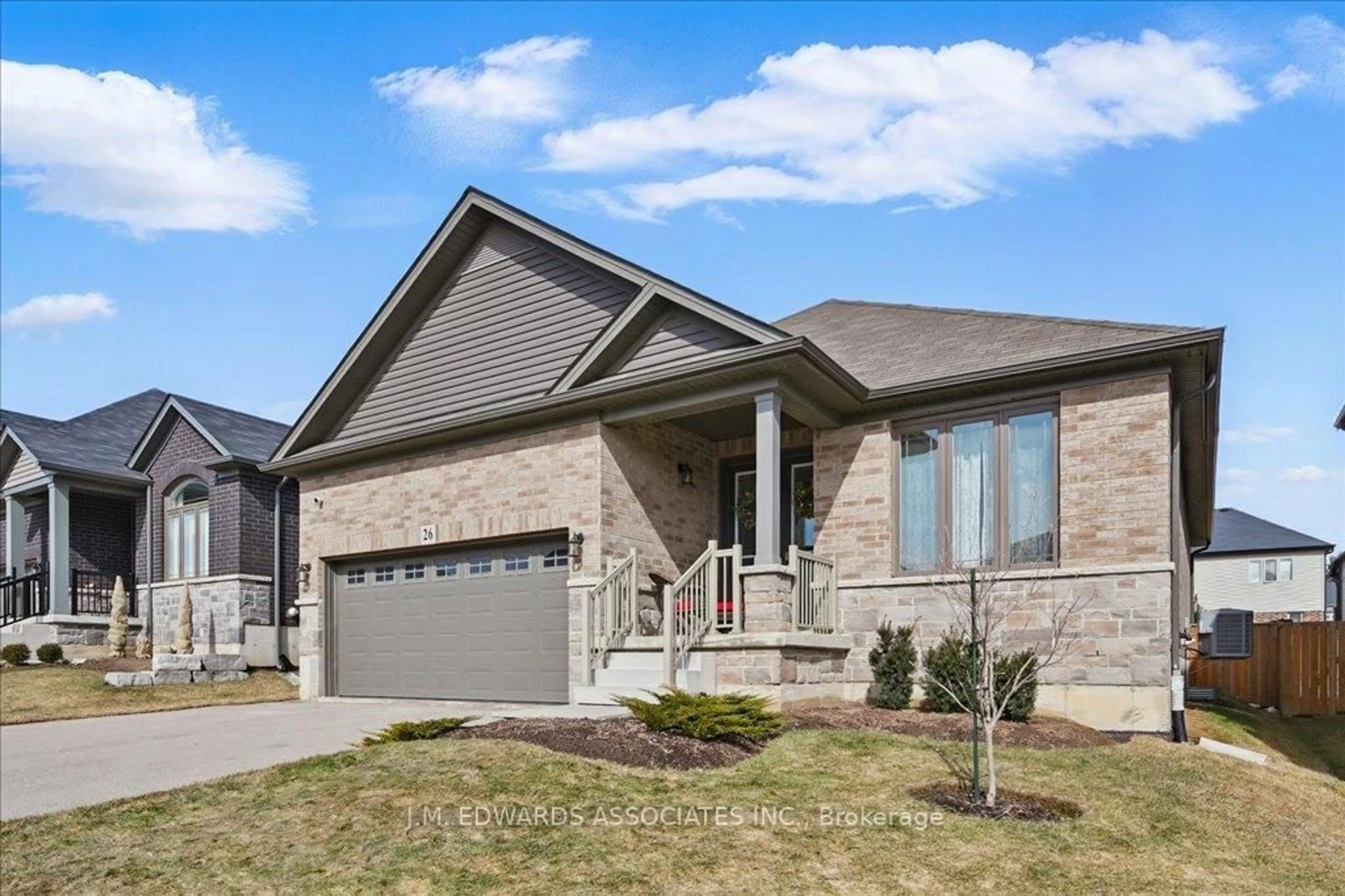 Home with brick exterior material, street for 26 McGovern Lane, Brant Ontario N3L 0K3