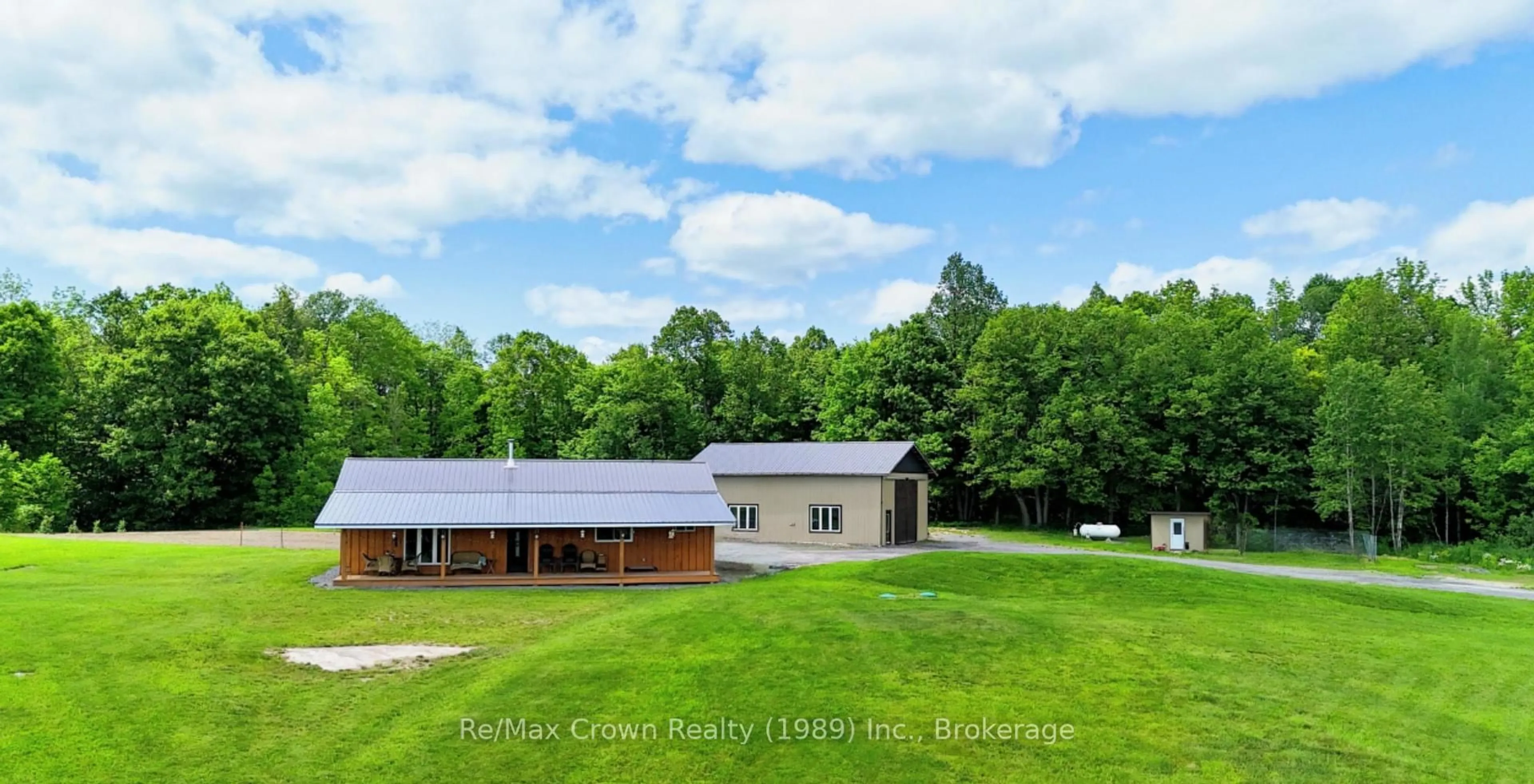 A pic from outside/outdoor area/front of a property/back of a property/a pic from drone, building for 303 Clear Lake Rd, Parry Sound Remote Area Ontario P0H 1A0