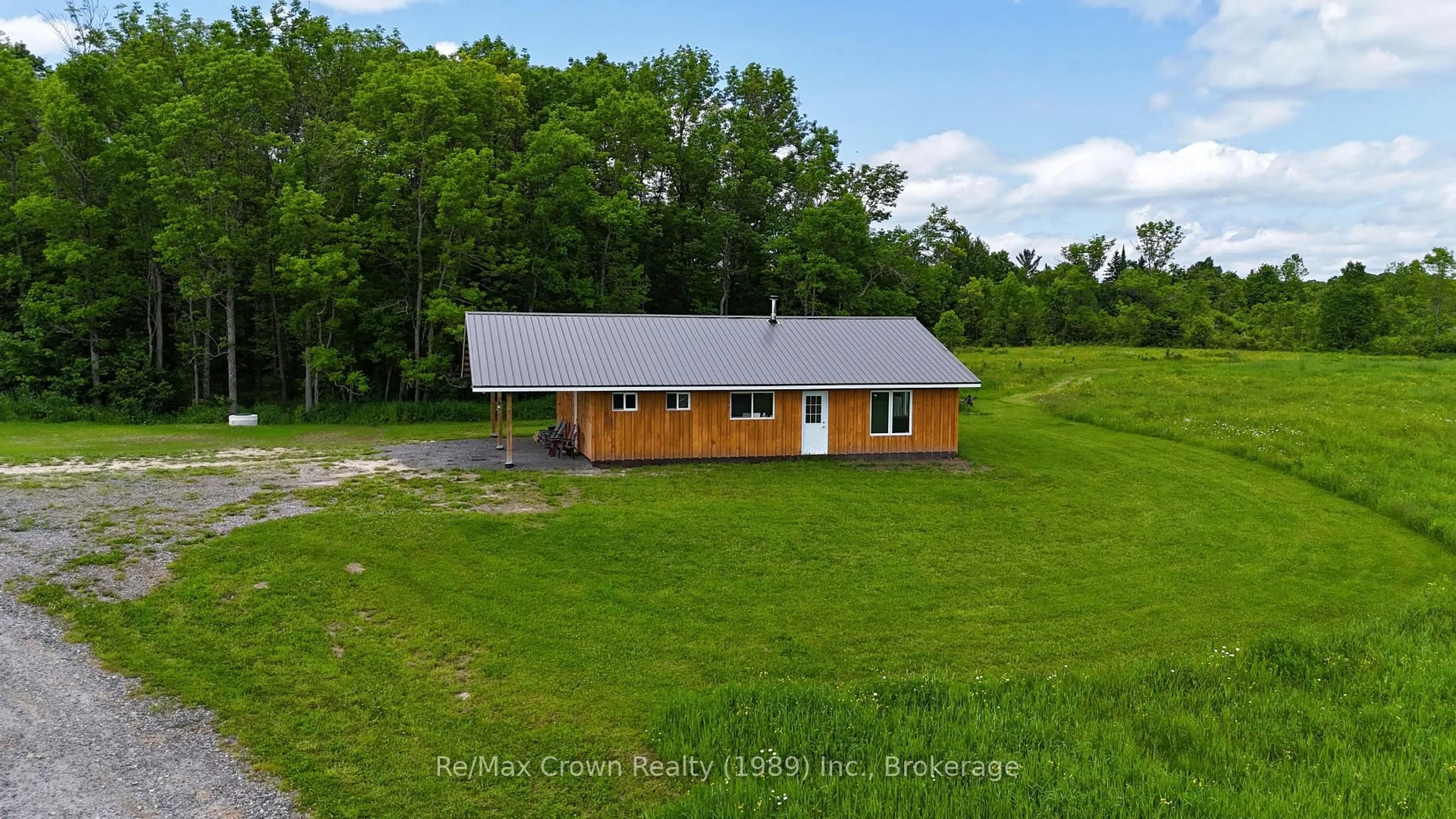 A pic from outside/outdoor area/front of a property/back of a property/a pic from drone, building for 303 Clear Lake Rd, Parry Sound Remote Area Ontario P0H 1A0