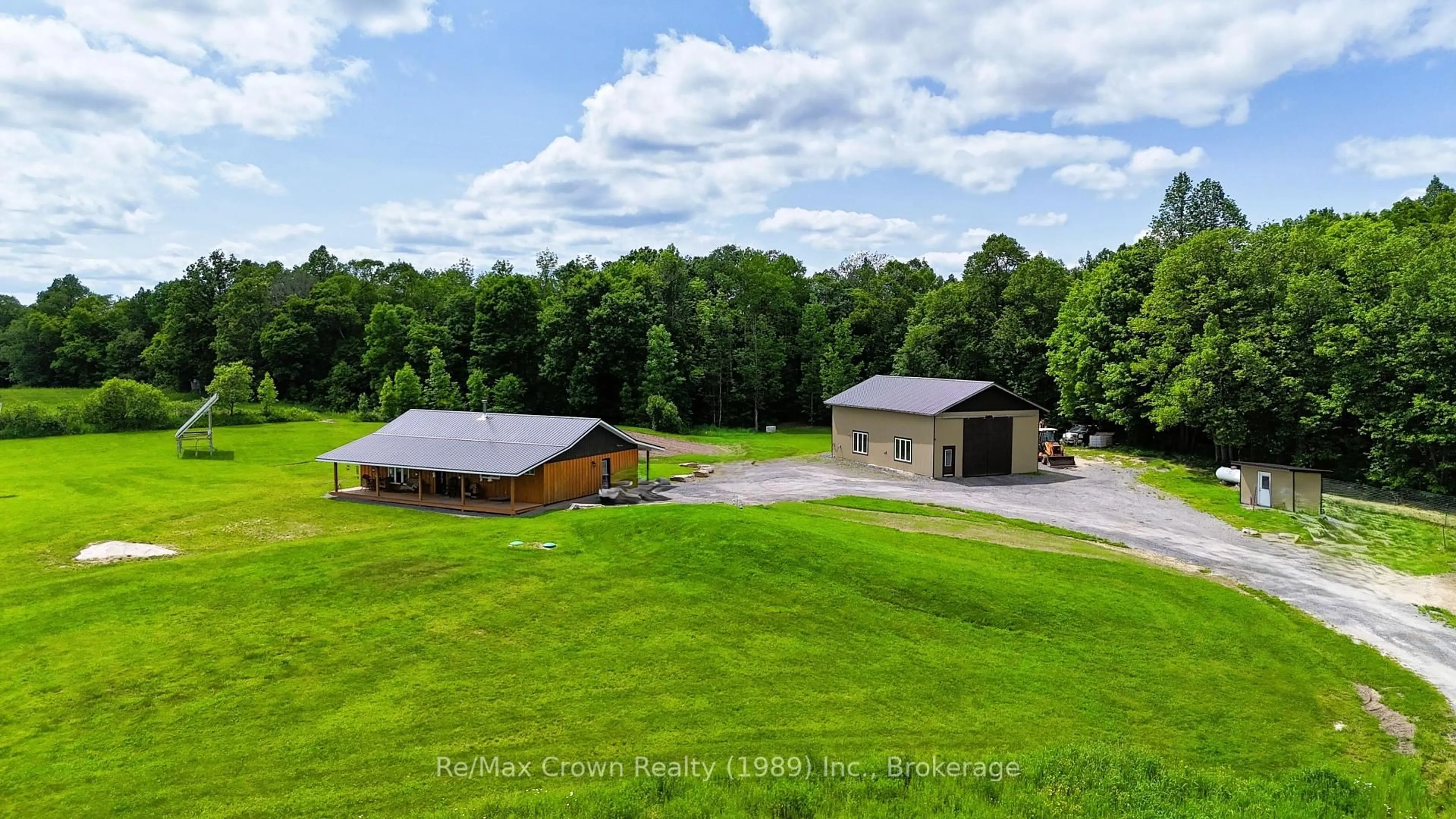 A pic from outside/outdoor area/front of a property/back of a property/a pic from drone, water/lake/river/ocean view for 303 Clear Lake Rd, Parry Sound Remote Area Ontario P0H 1A0